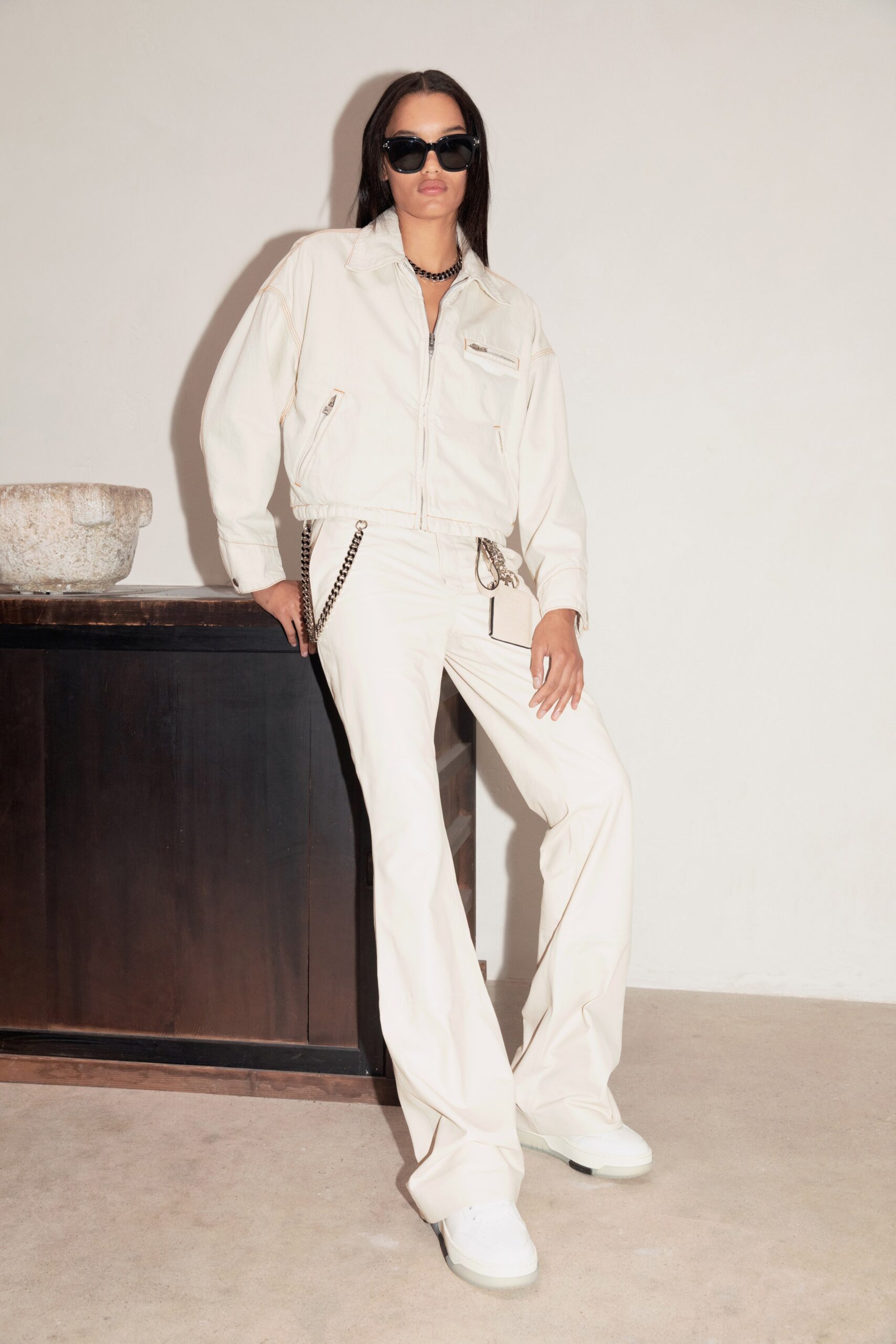 white relaxed jacket with flared pants