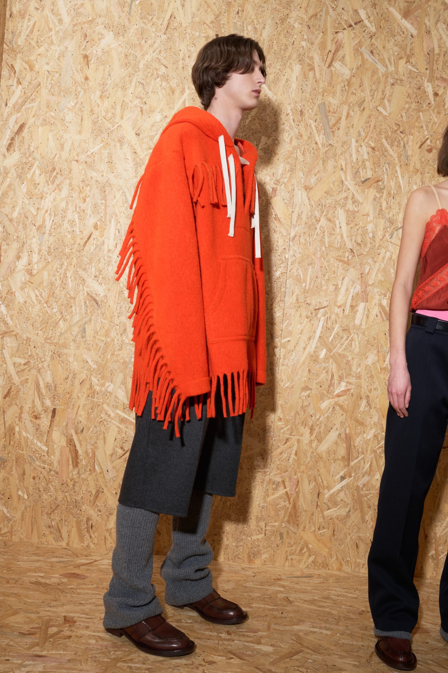 oversized orange hoodie with gray pants
