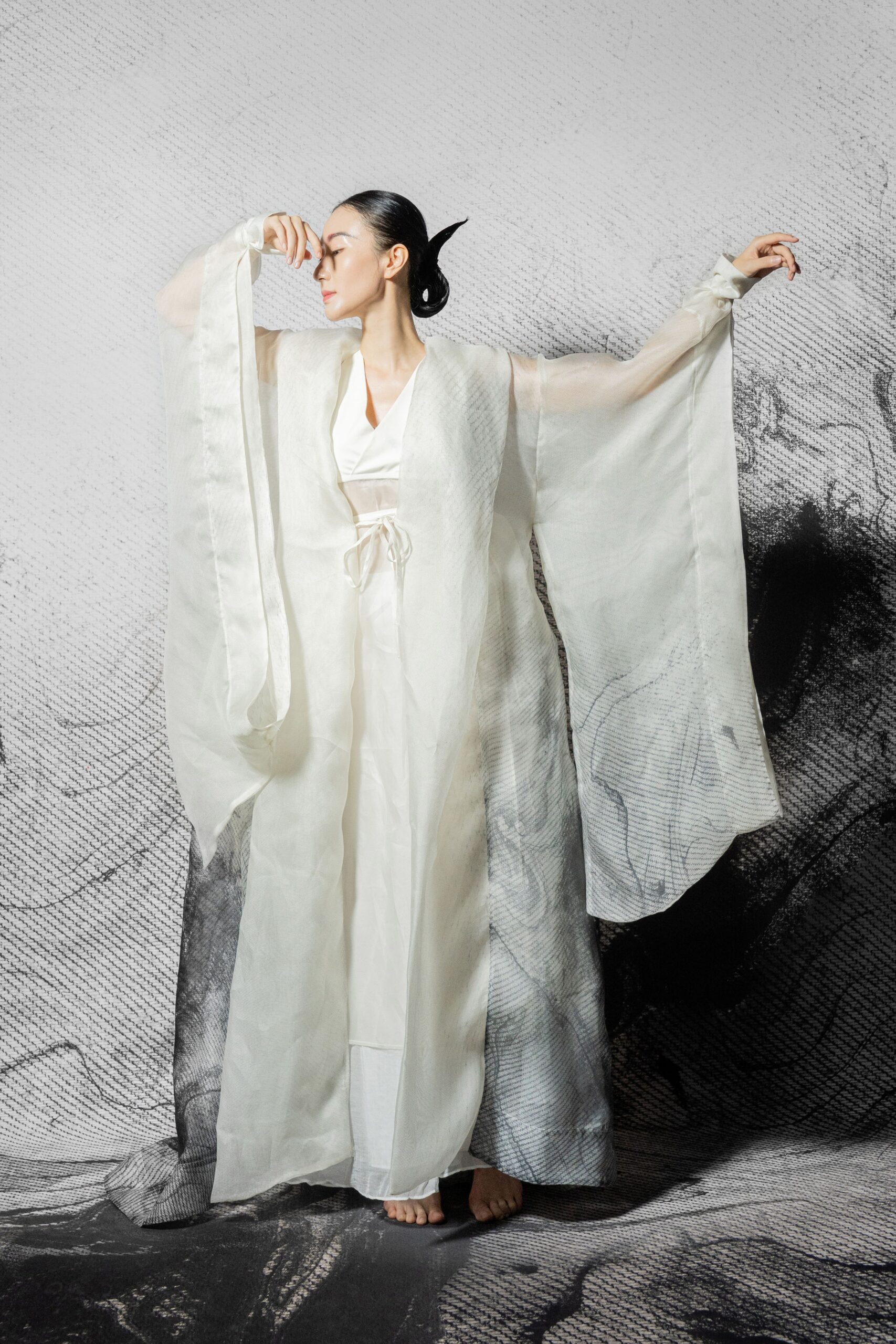 white silk layered dress and cape