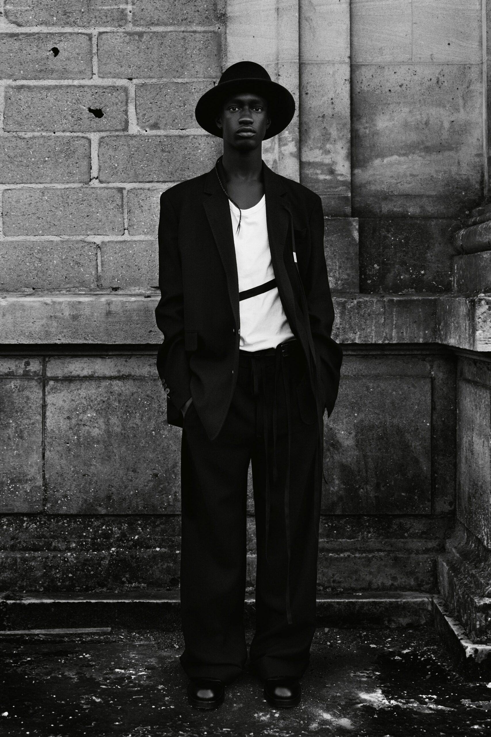 black relaxed suit with white t-shirt