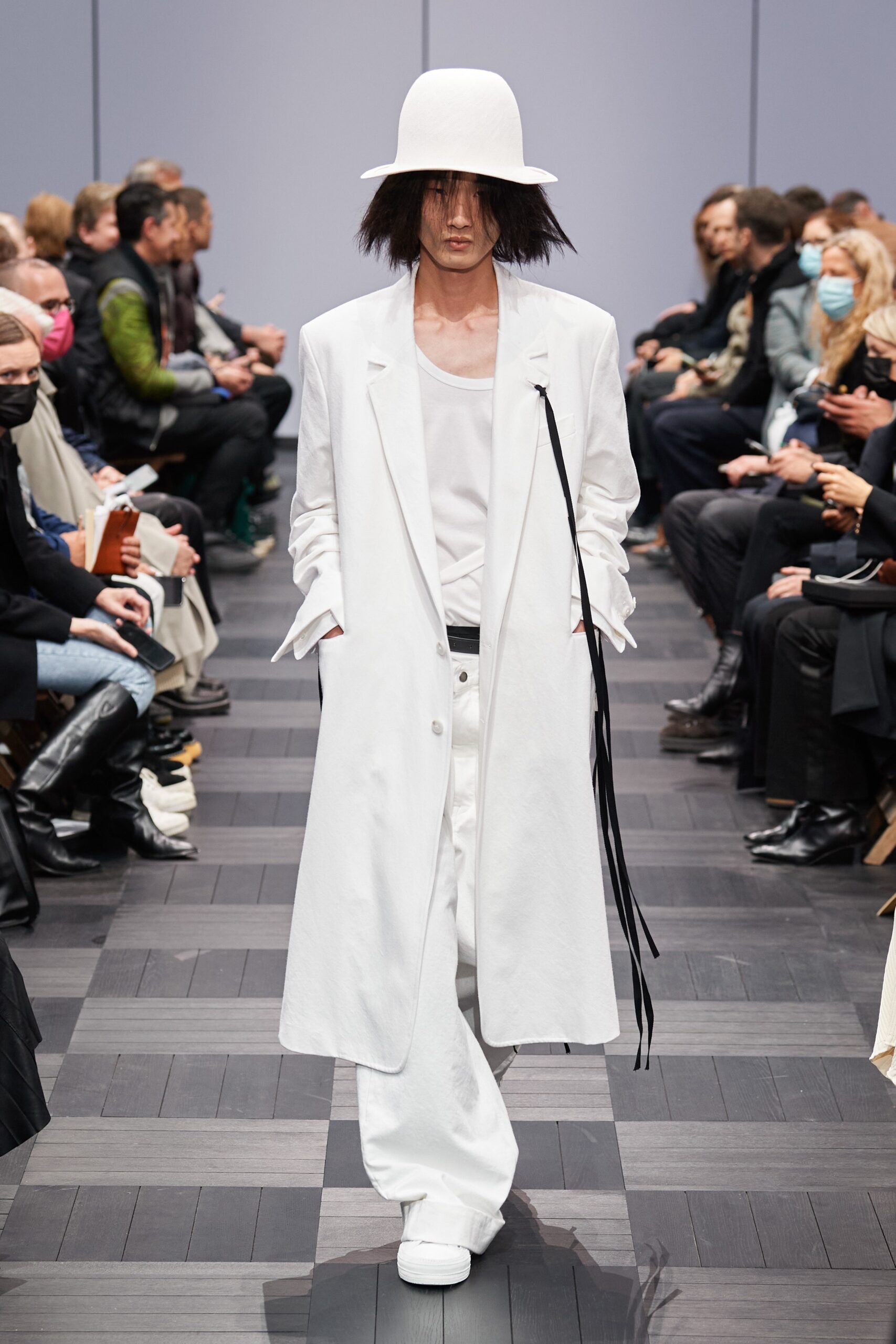 white cotton long-sleeve collared oversized buttoned coat