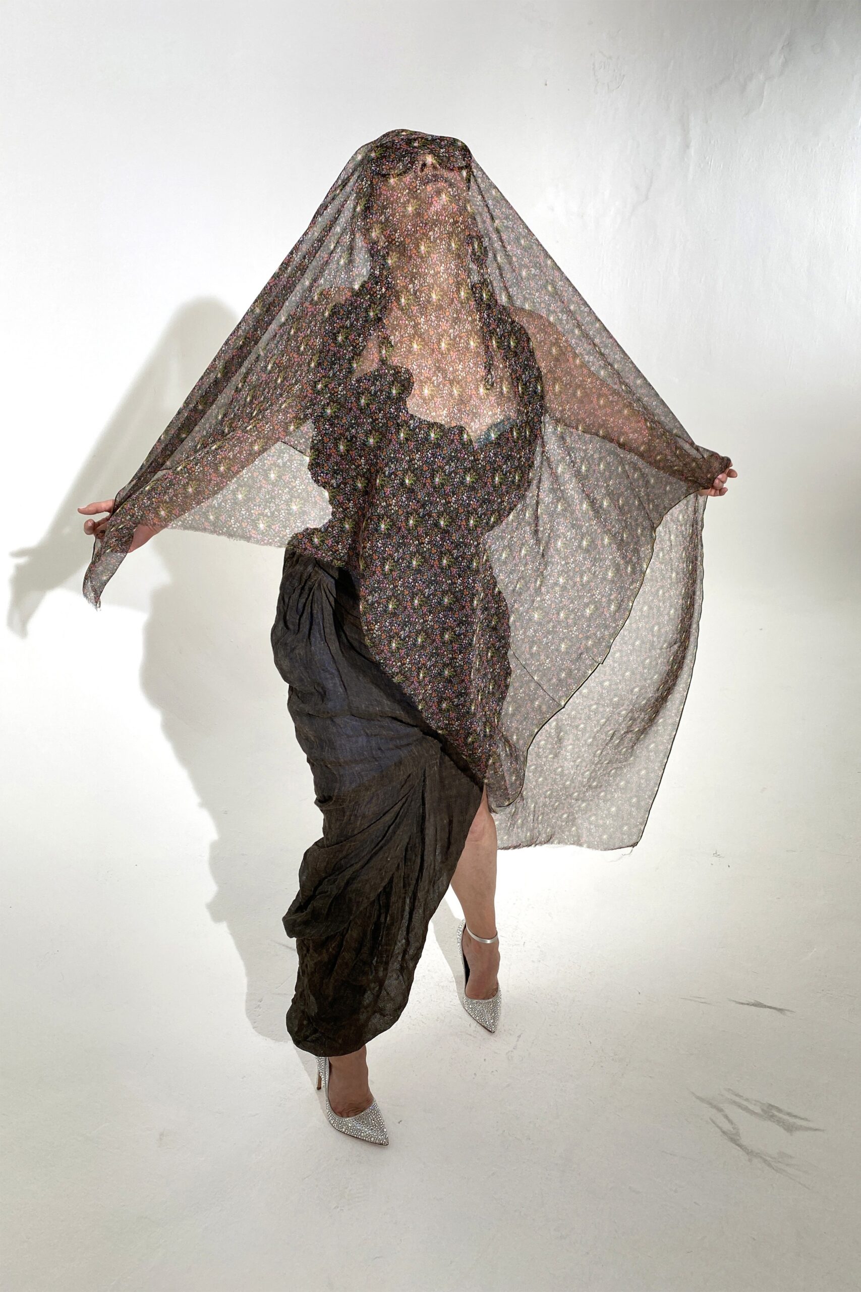 black fitted midi dress with sheer scarf