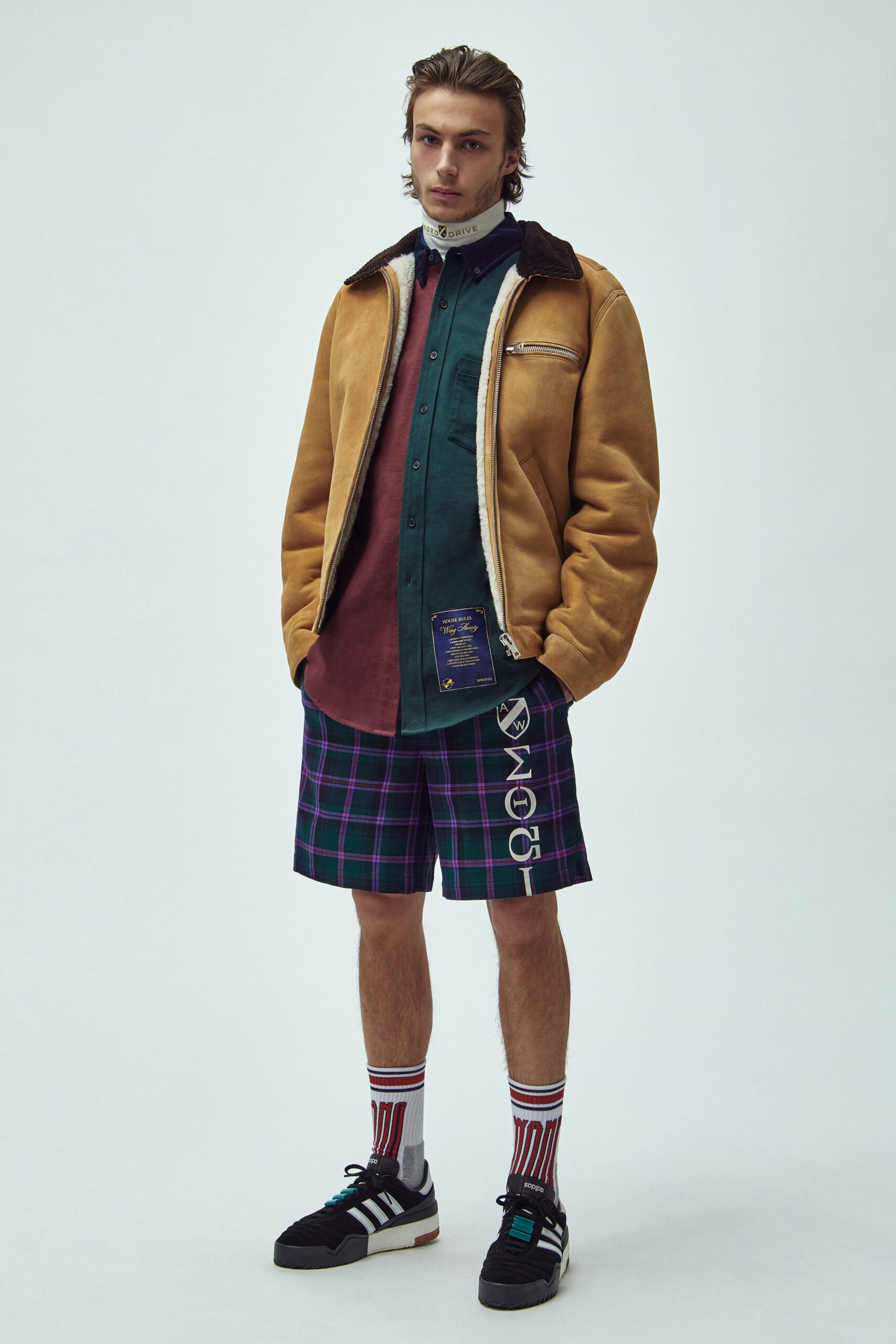 brown suede jacket with green shirt
