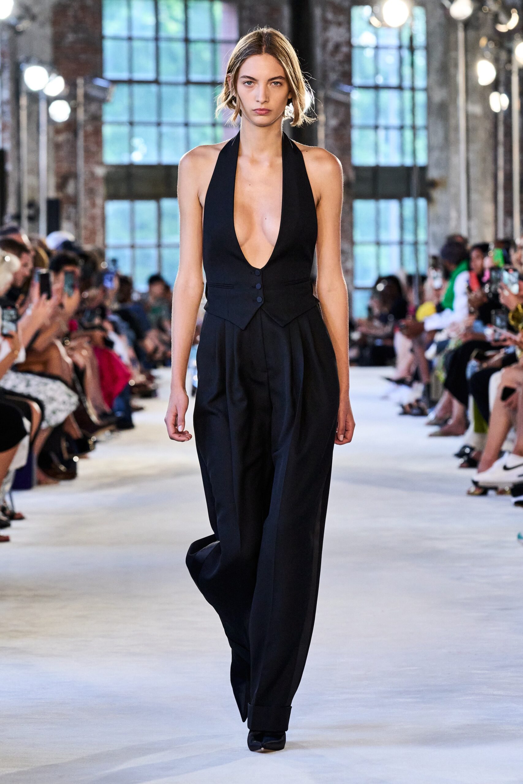 black fitted sleeveless jumpsuit