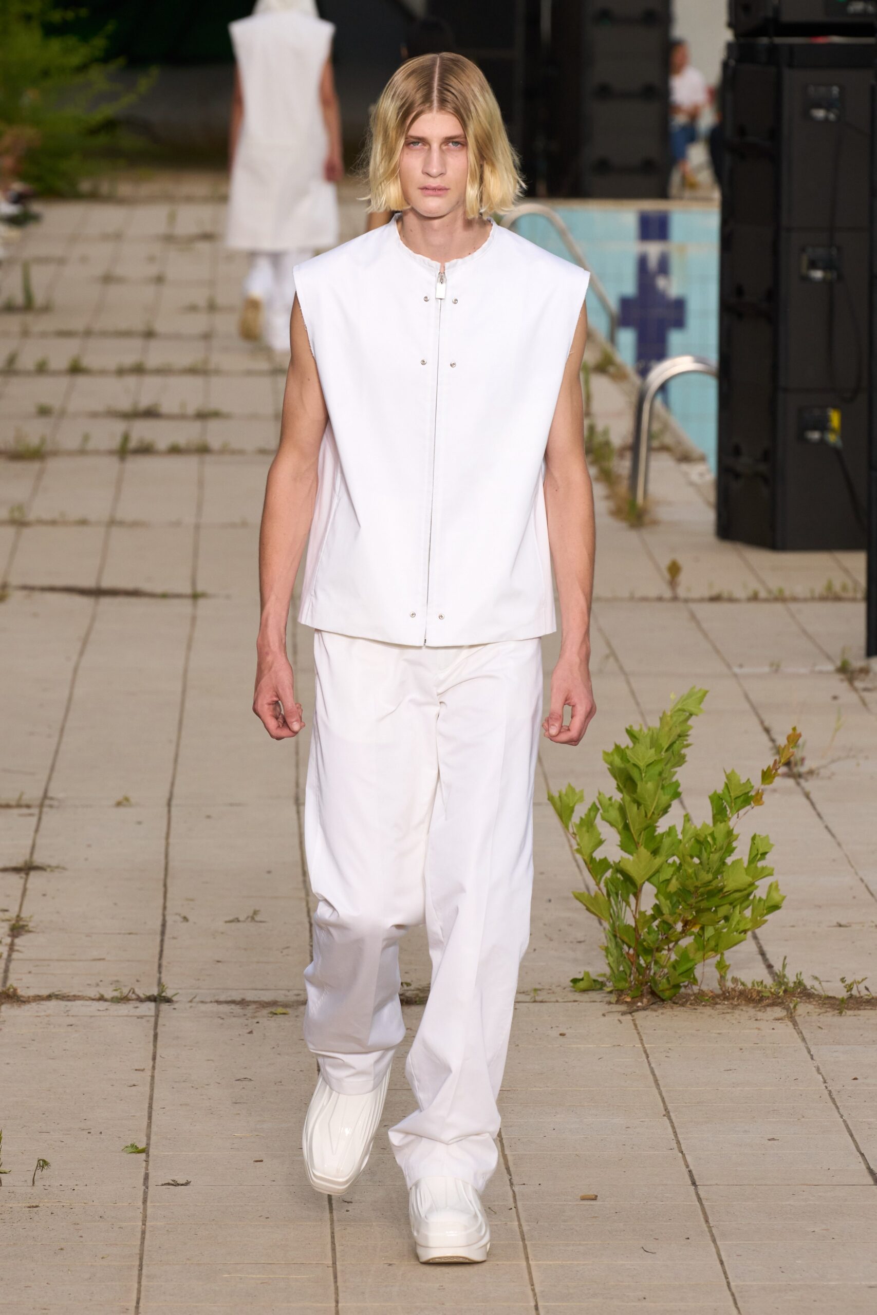 white fitted vest and relaxed pants