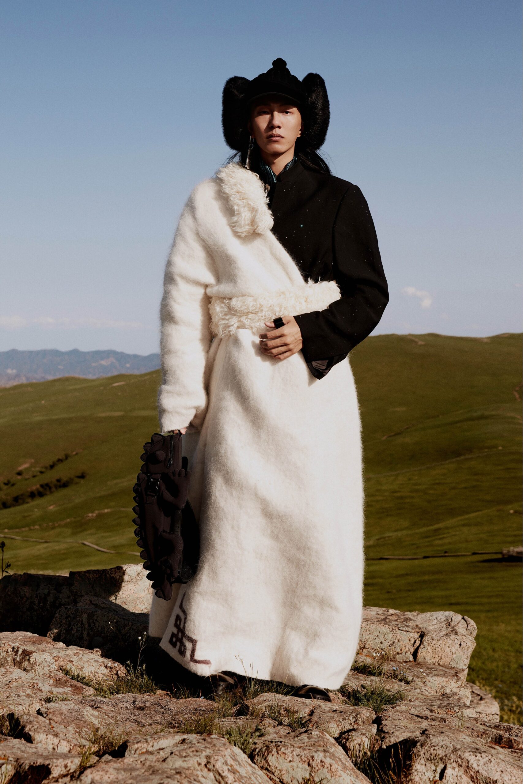 black wool coat white cape