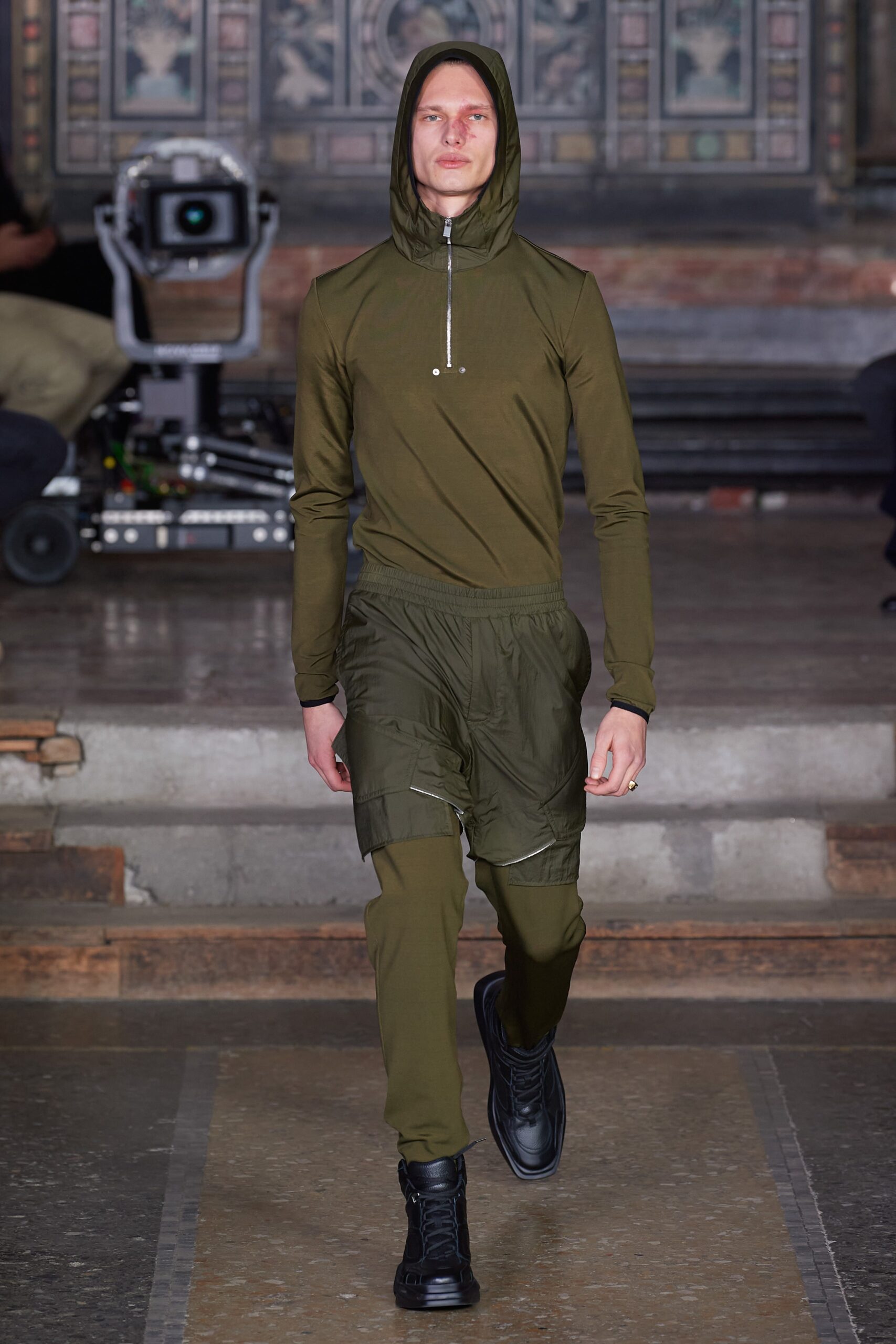 green fitted hoodie and cargo pants