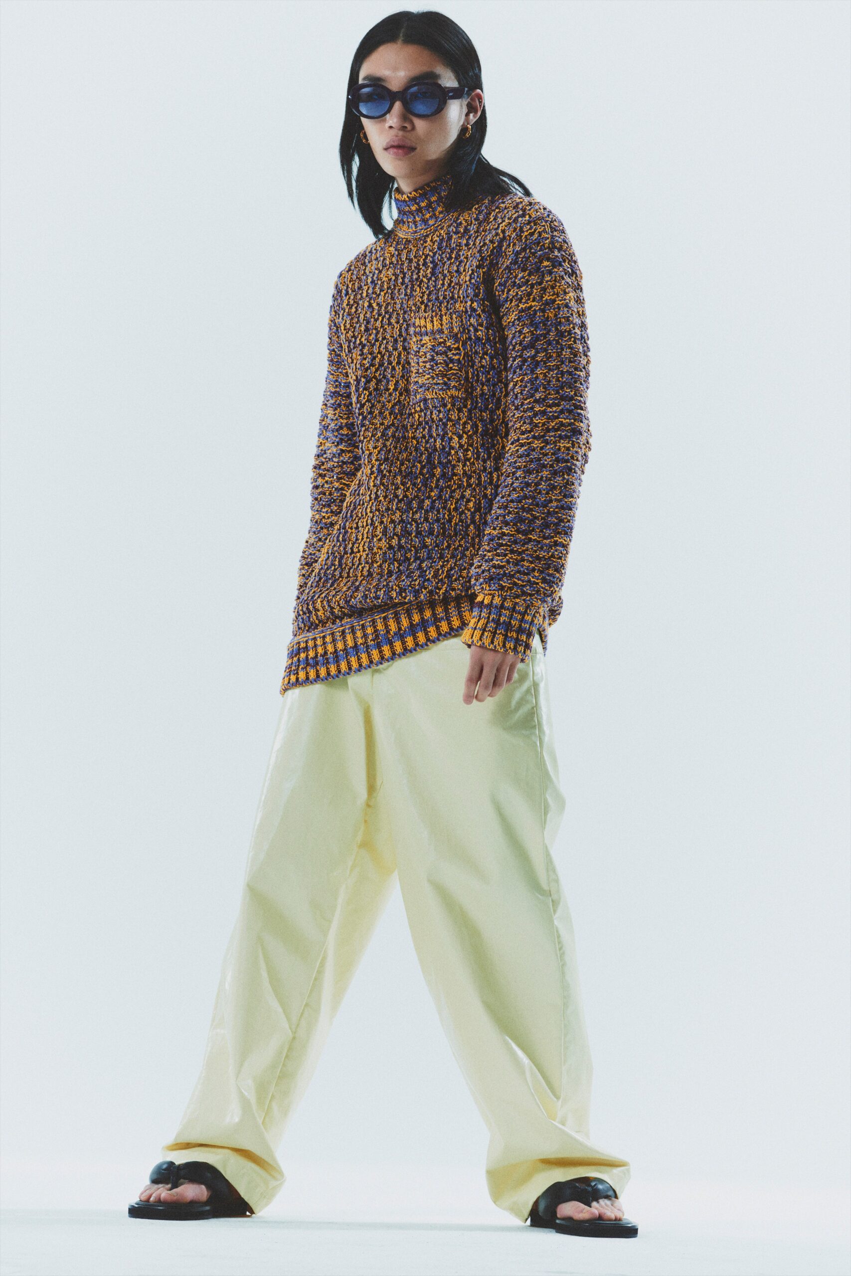 relaxed purple knitted sweater and yellow pants