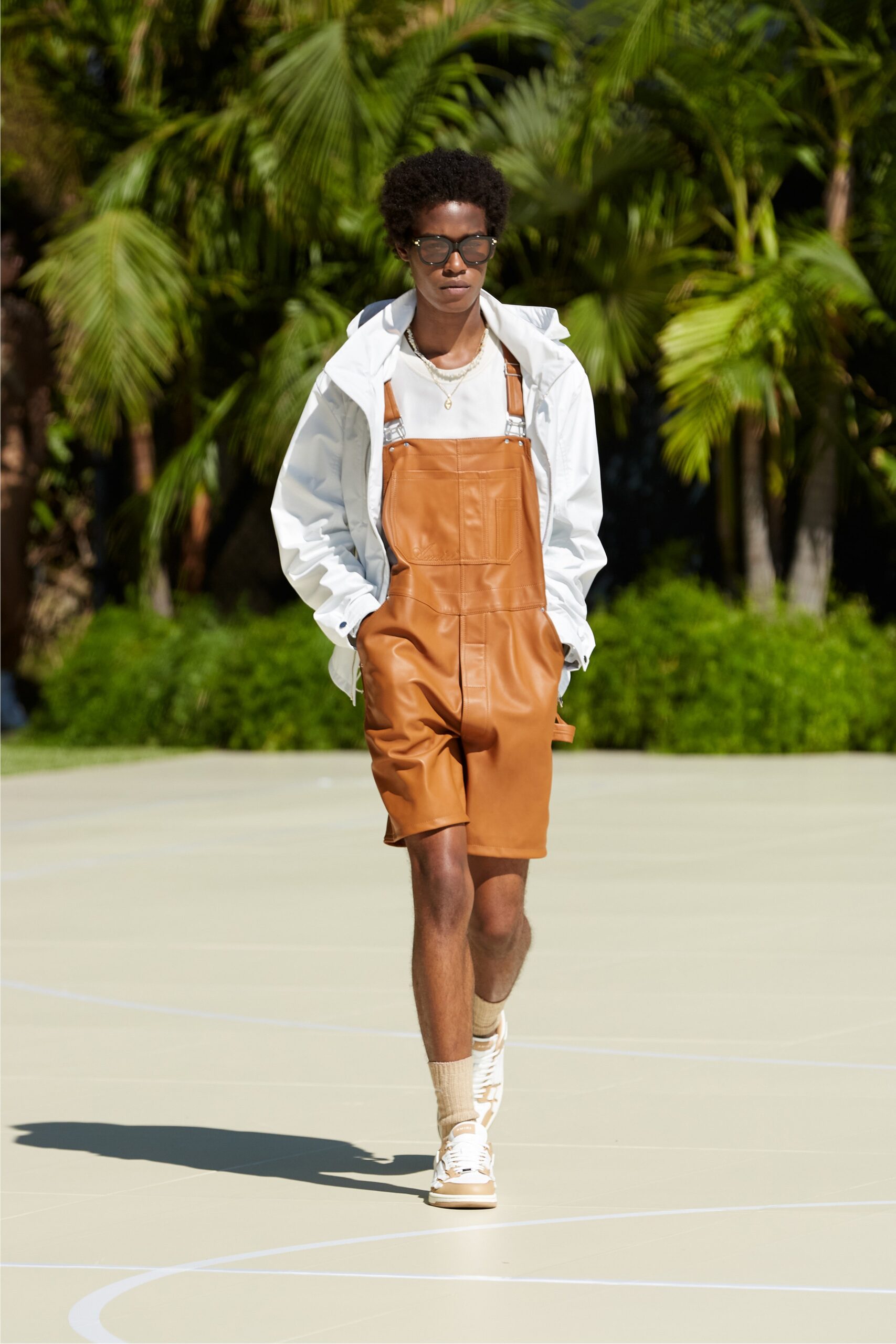 white jacket brown leather overalls