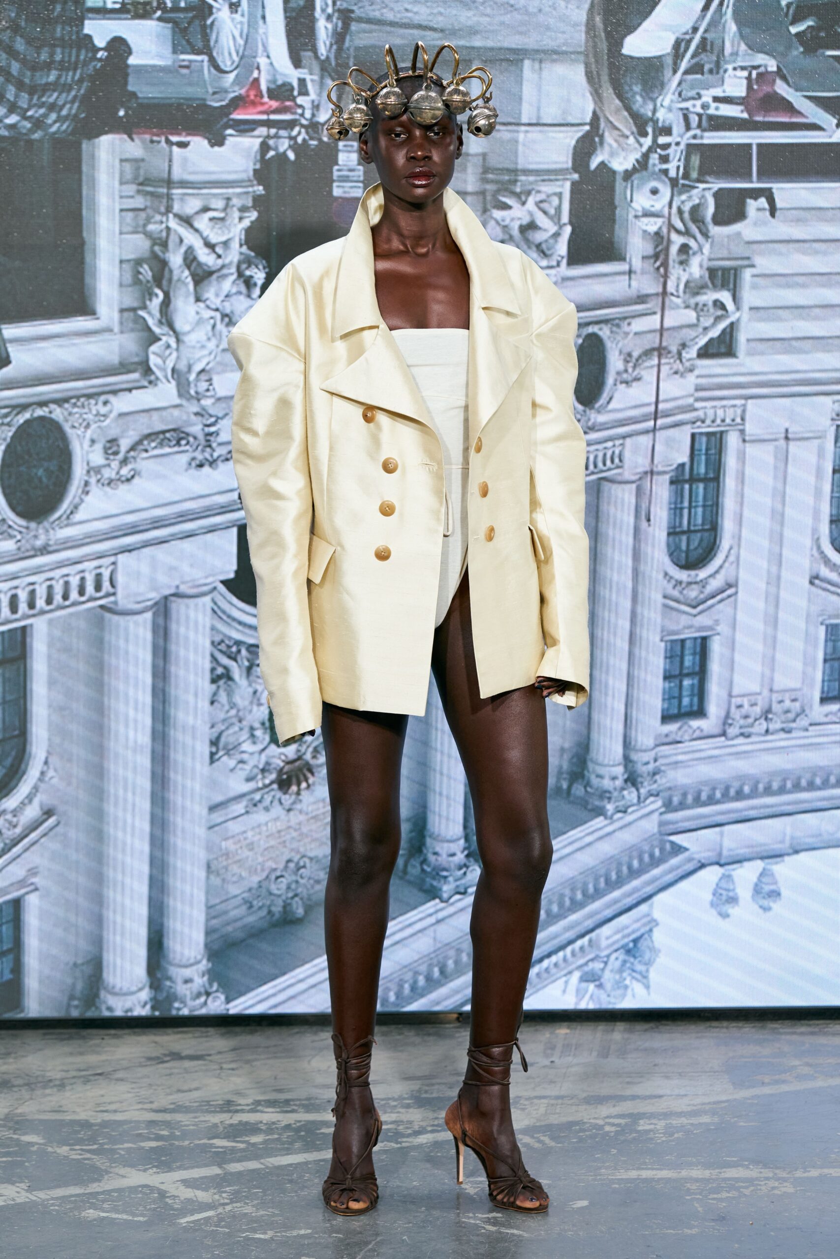 white silk long-sleeve collared oversized buttoned jacket