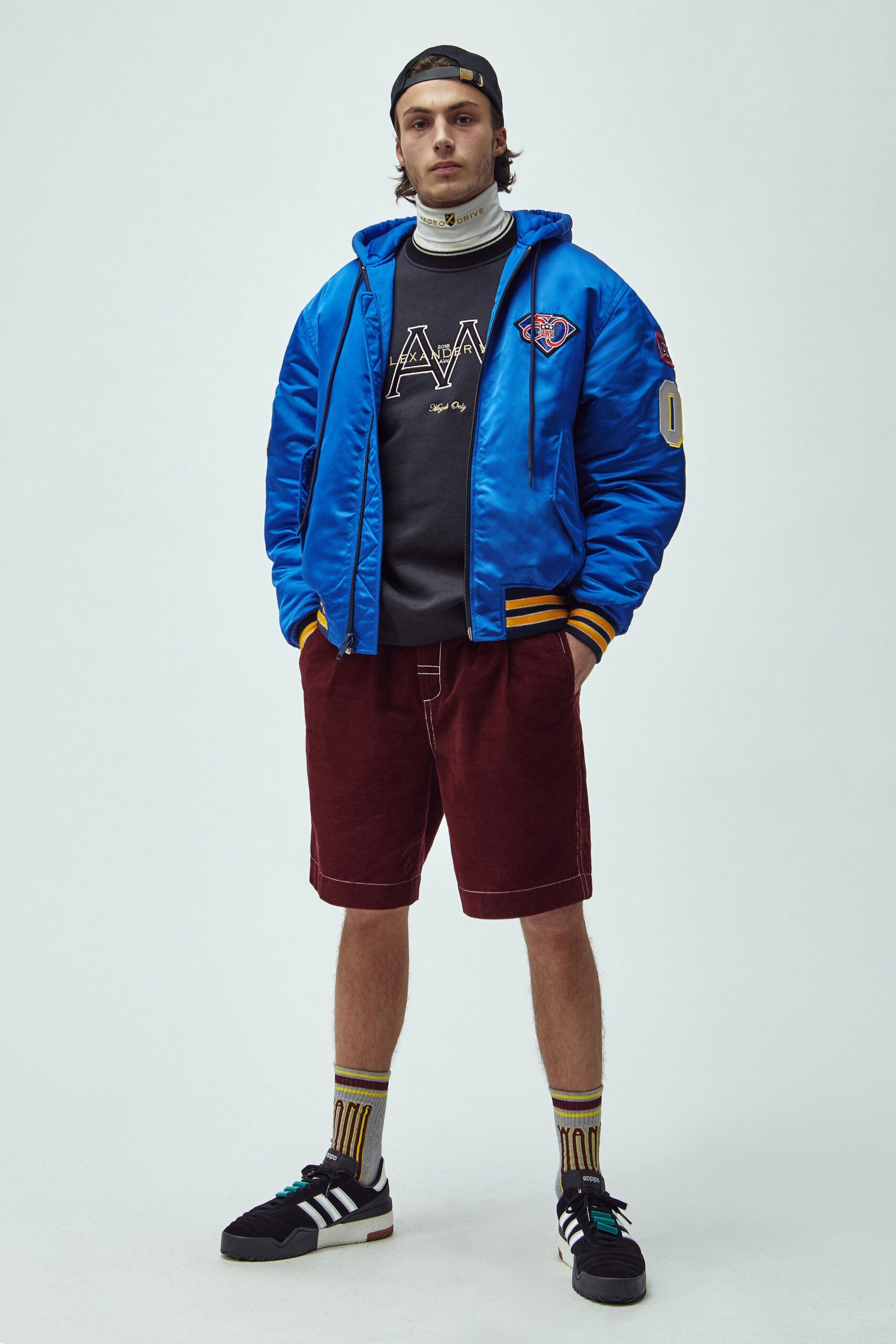 blue relaxed jacket with maroon shorts