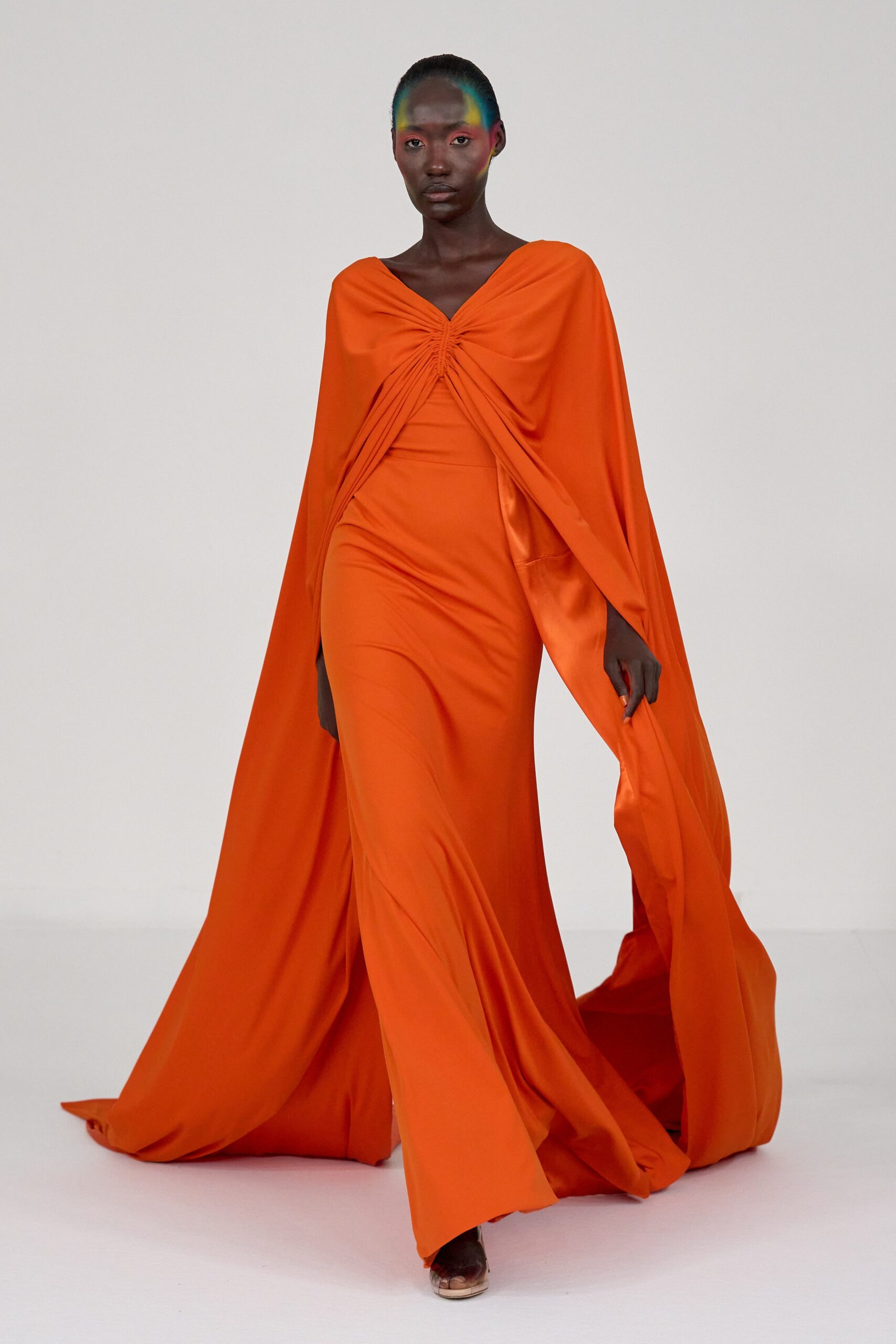 orange silk sleeveless v-neck fitted draped flowing gown