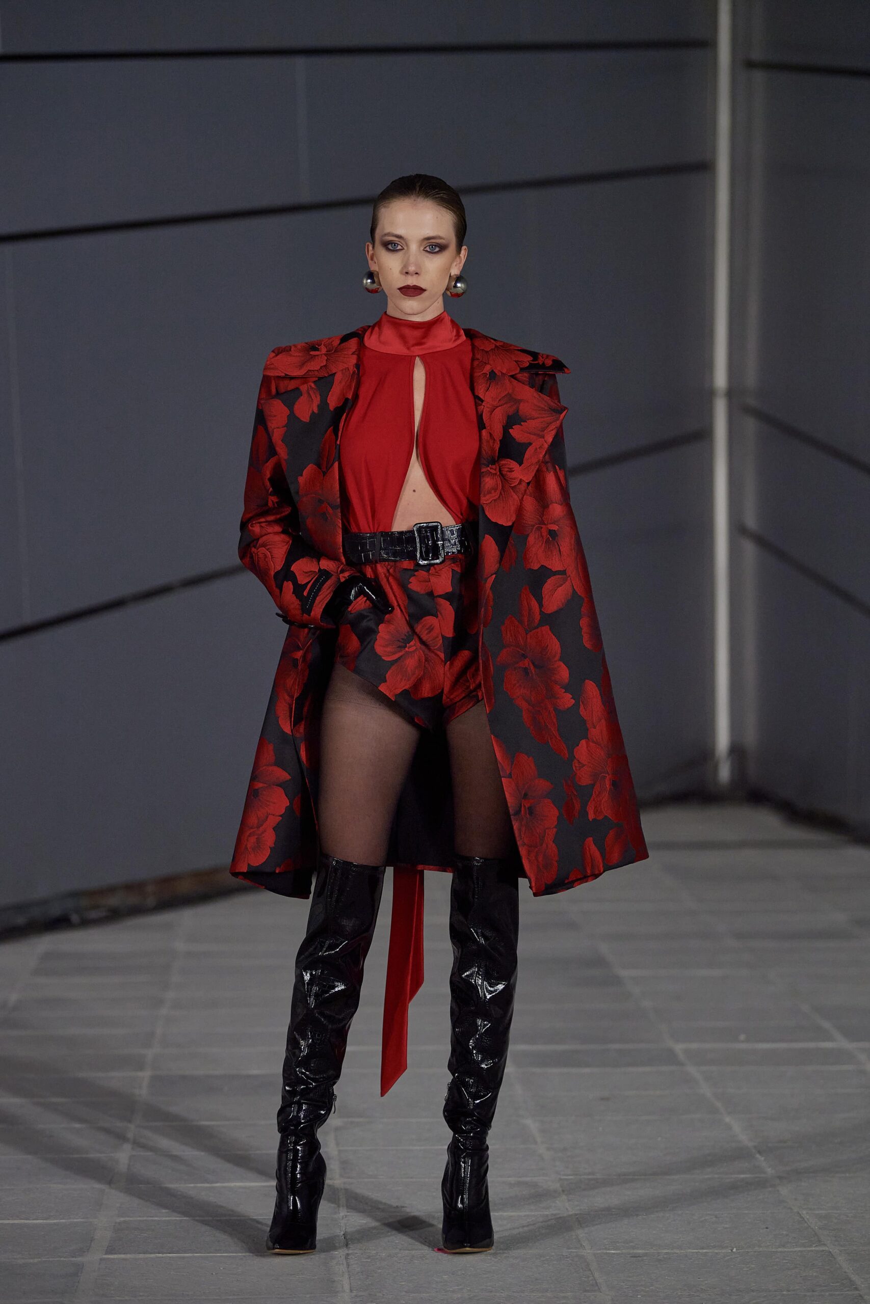 red floral coat with black bodysuit