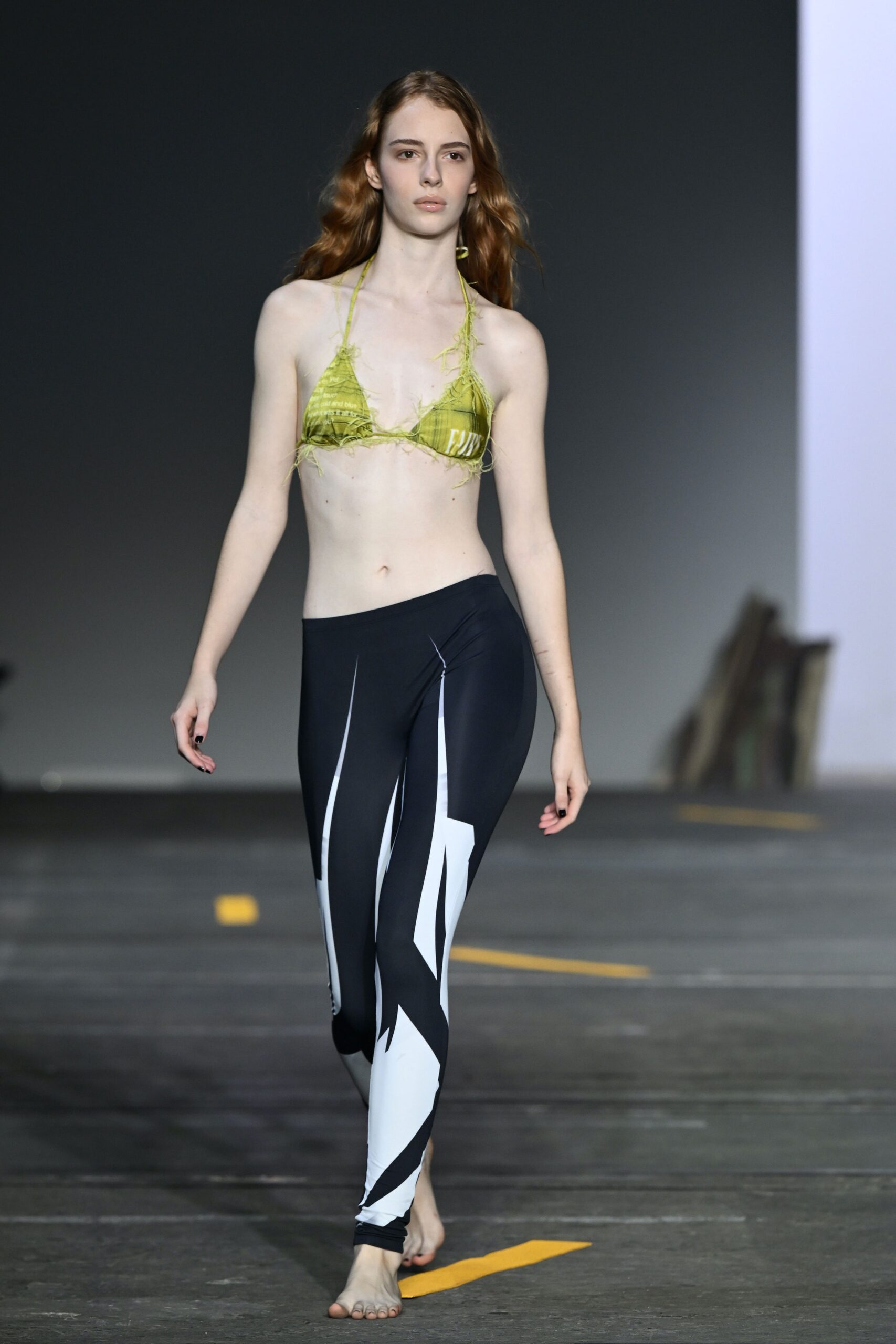 green mesh bikini and black leggings