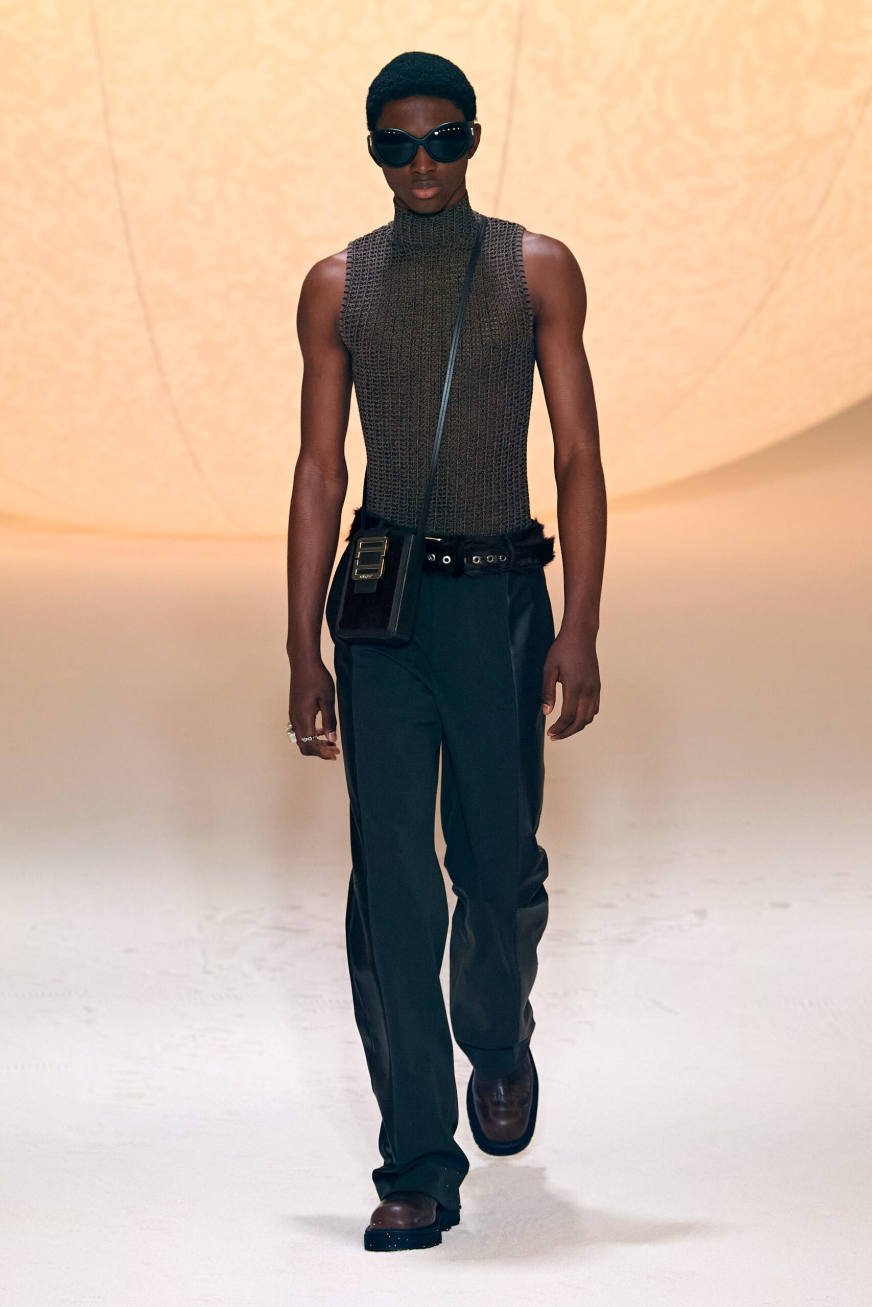 black knit sleeveless high-neck fitted top