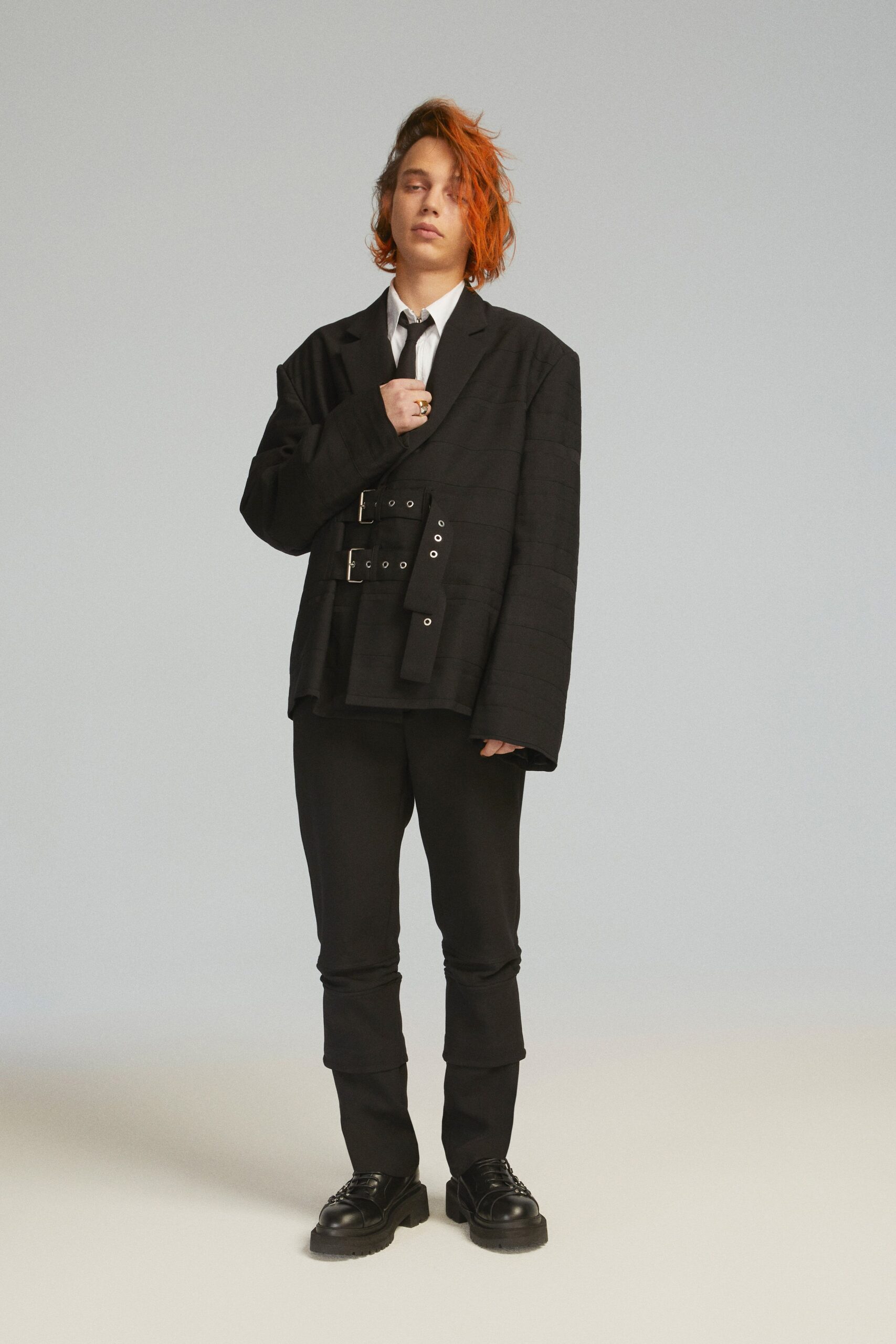 oversized black jacket and relaxed pants
