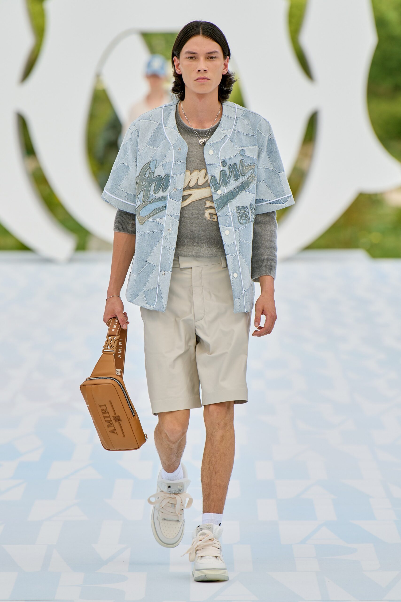 blue denim shirt gray sweater beige shorts
