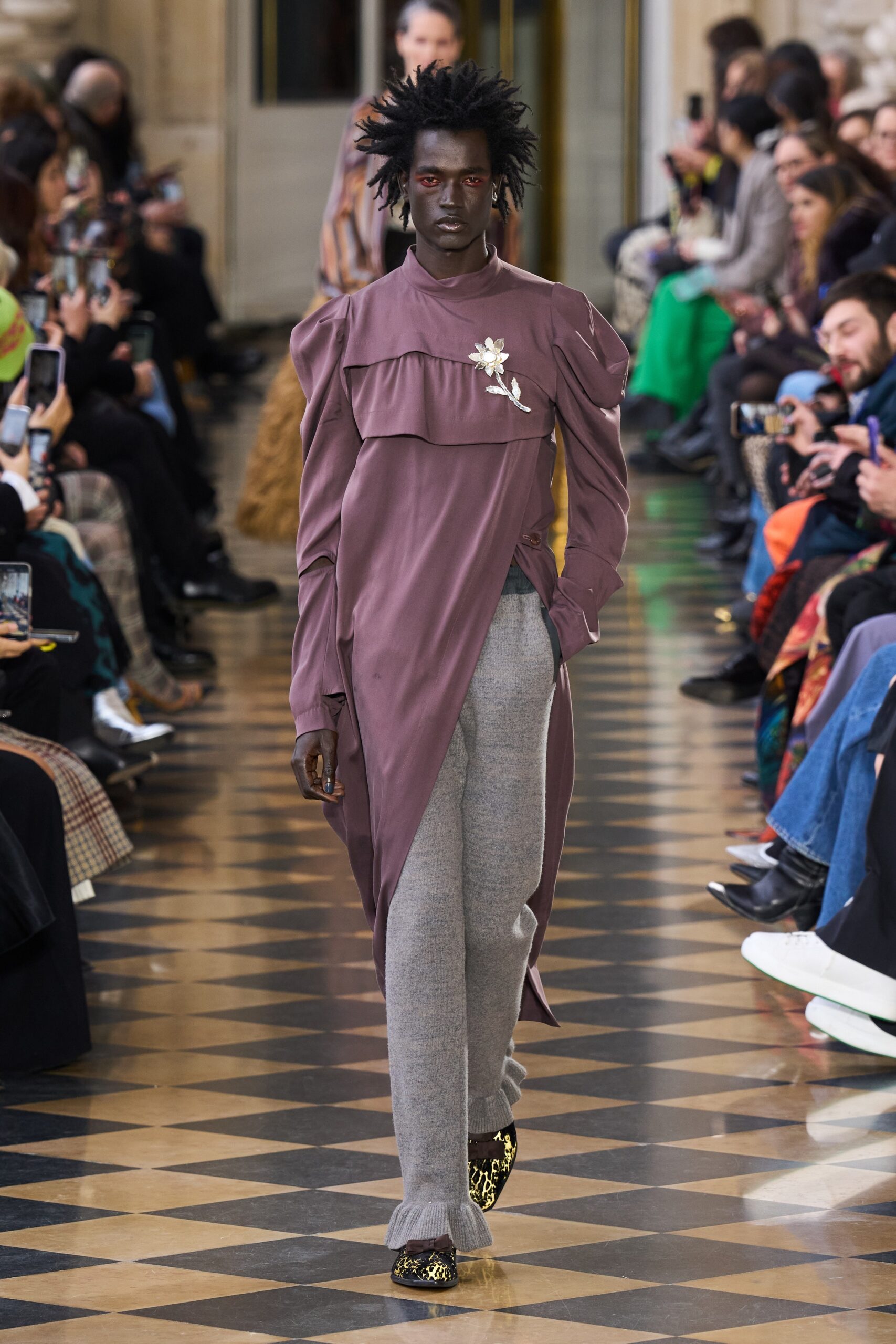 purple draped midi dress with gray pants