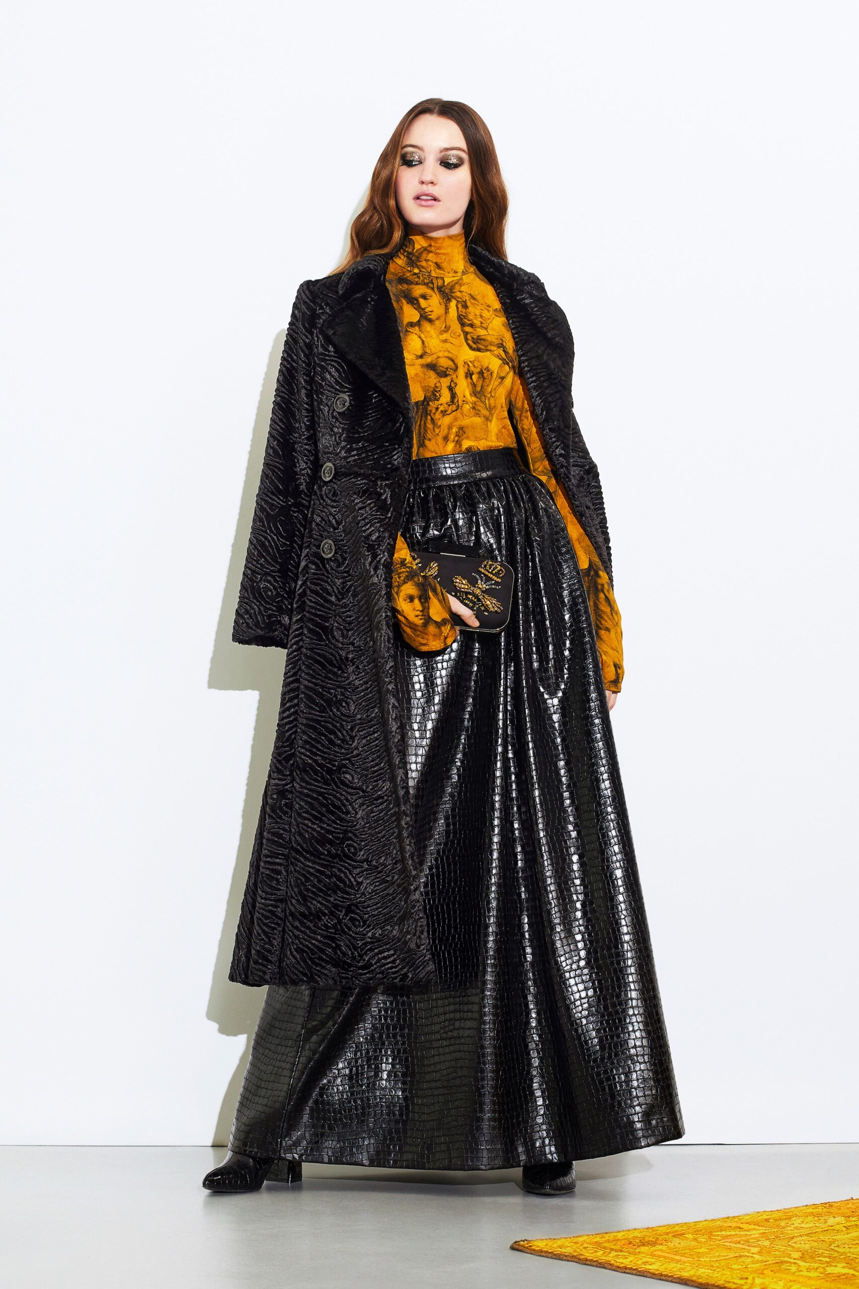 black leather coat yellow silk top
