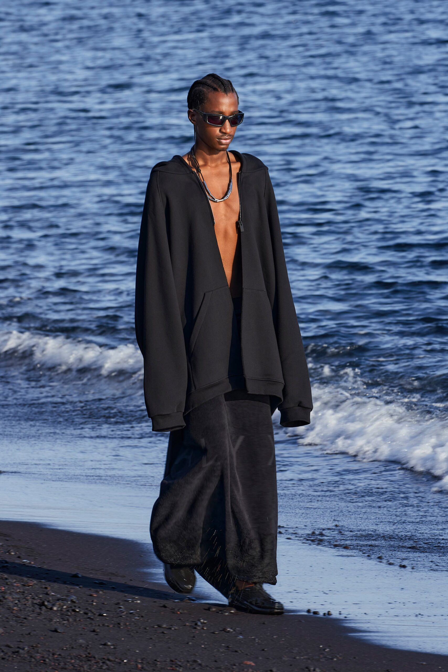 black oversized hoodie and midi skirt