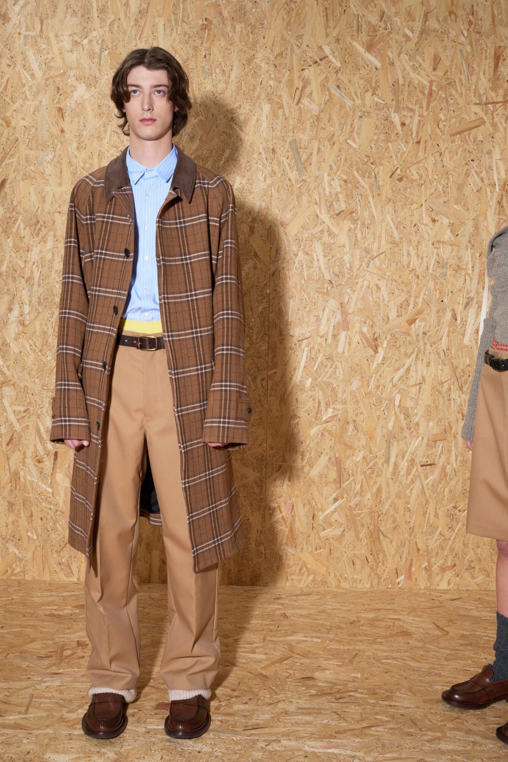 brown checked coat with blue shirt