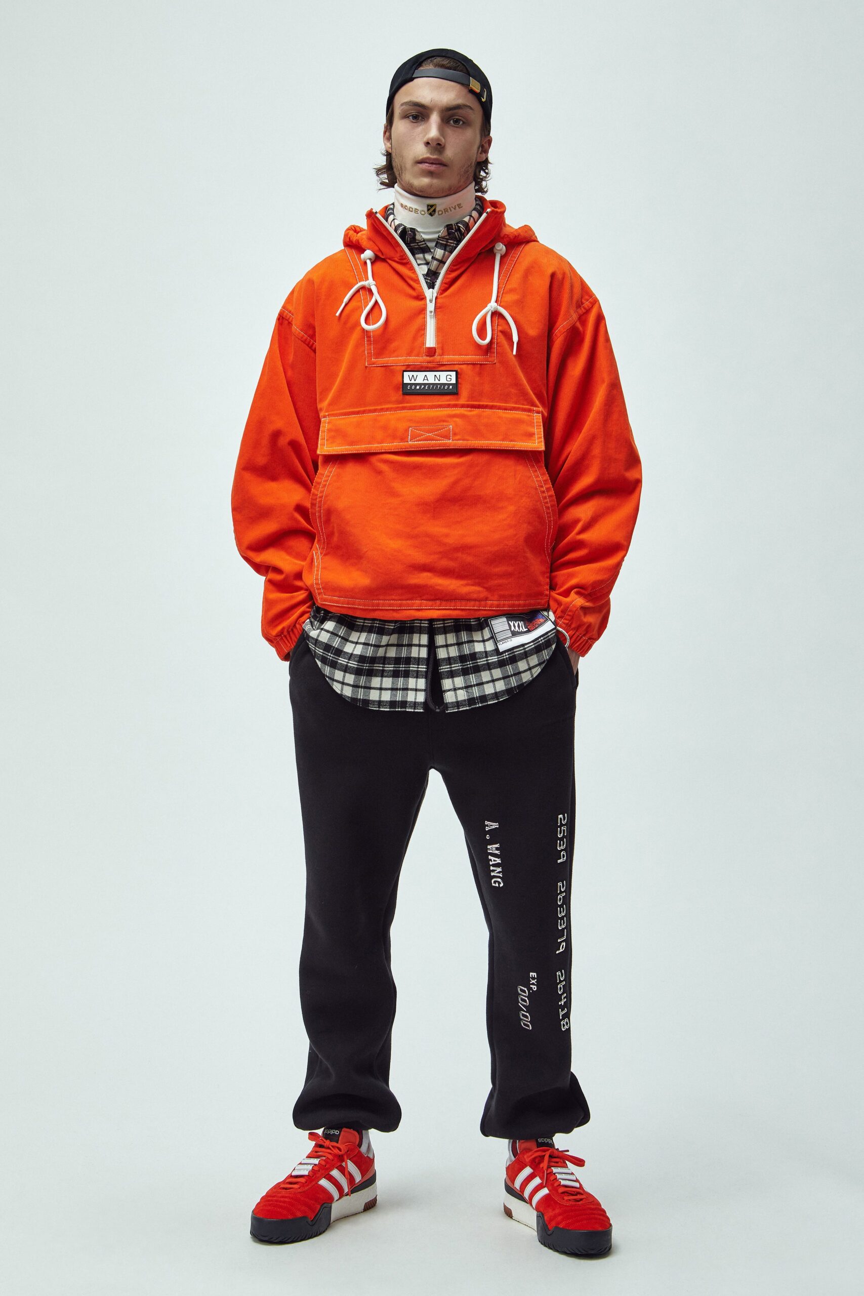 orange hoodie with checked shirt