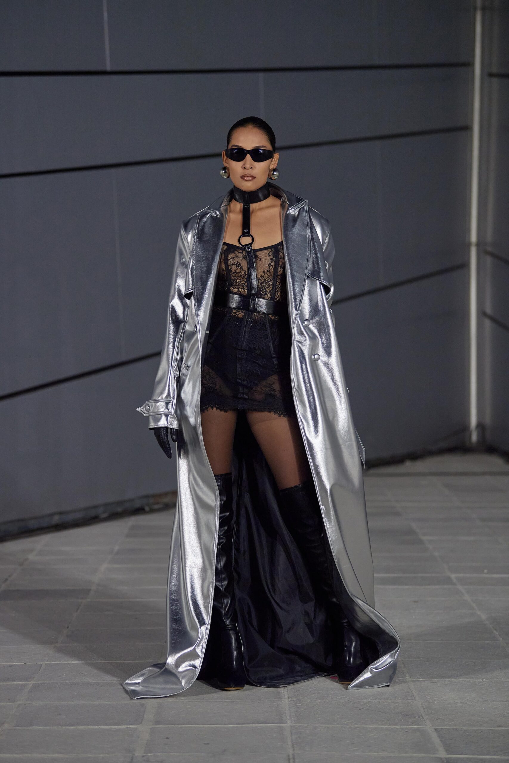 silver vinyl coat with black bodysuit
