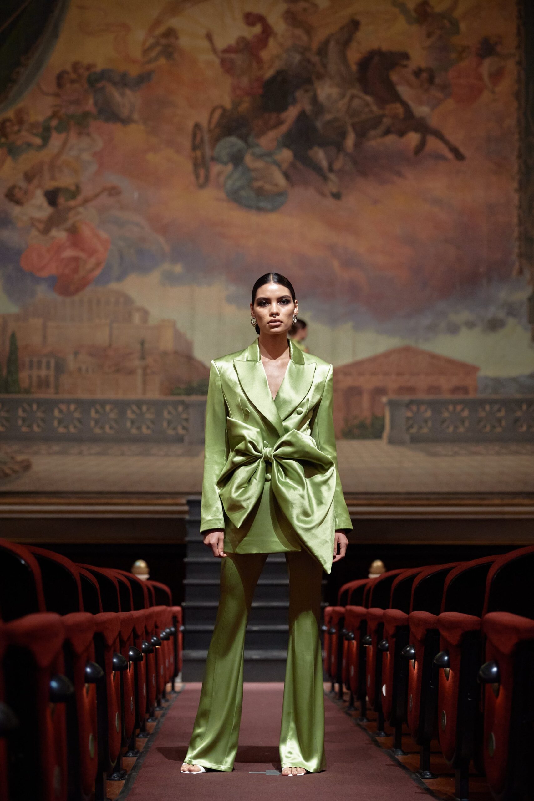 green satin long-sleeve collared fitted belted shiny suit
