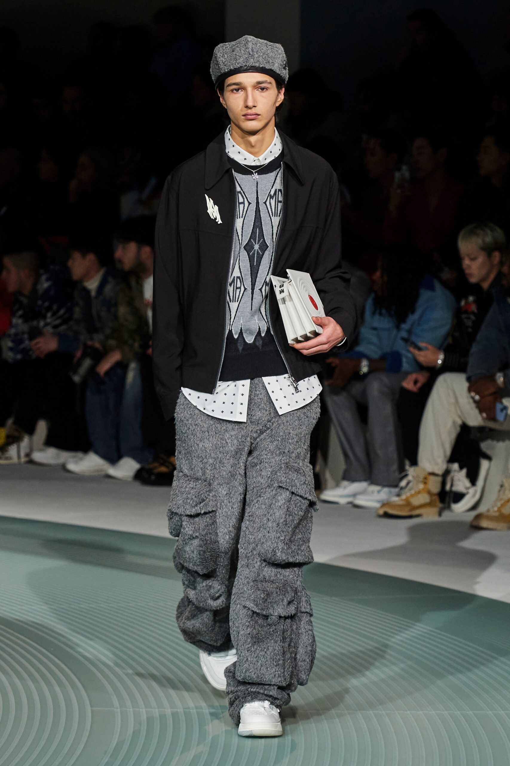 black jacket white shirt gray pants