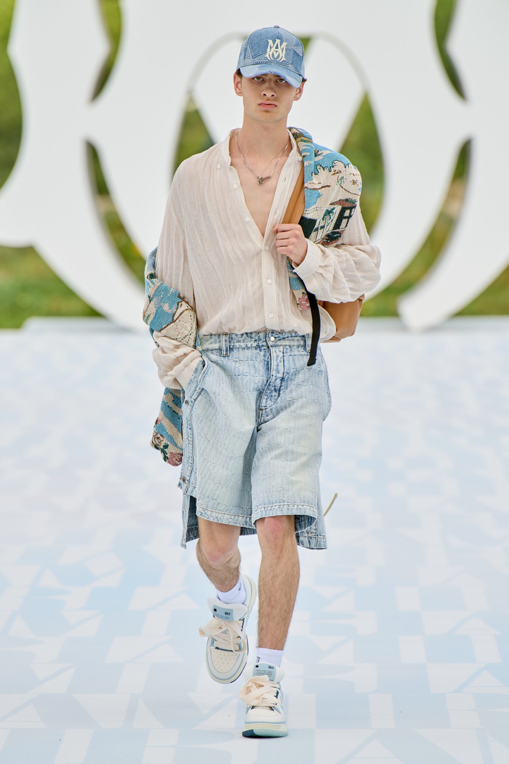 beige relaxed shirt with blue denim shorts