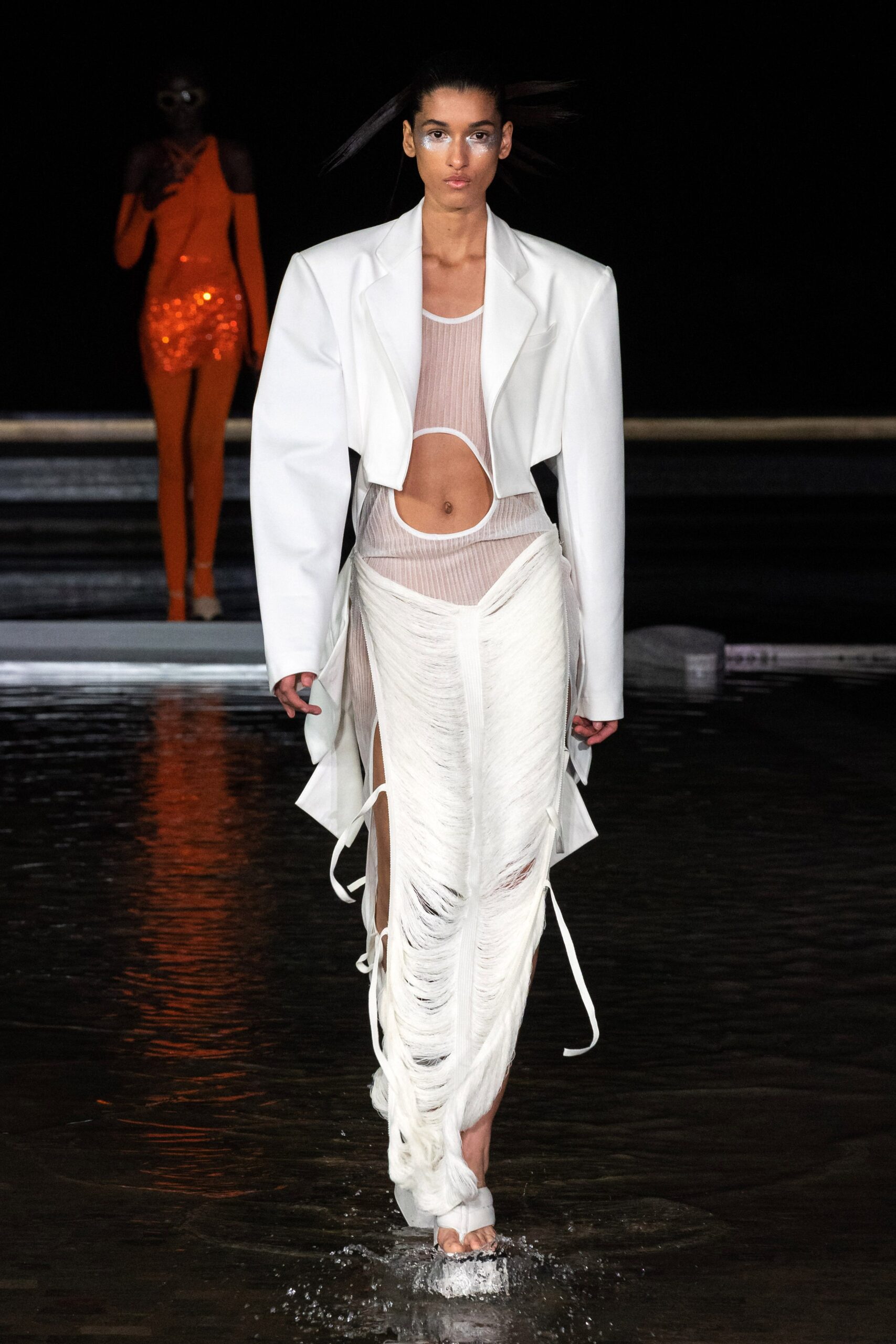 oversized white coat and fitted dress