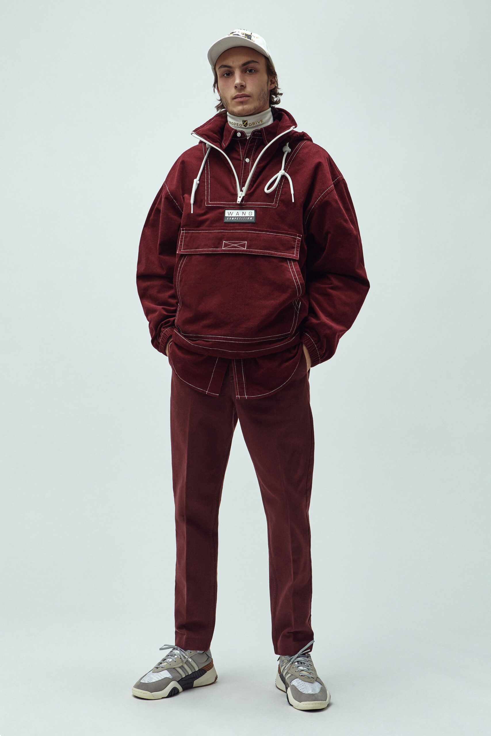red relaxed hoodie and fitted pants