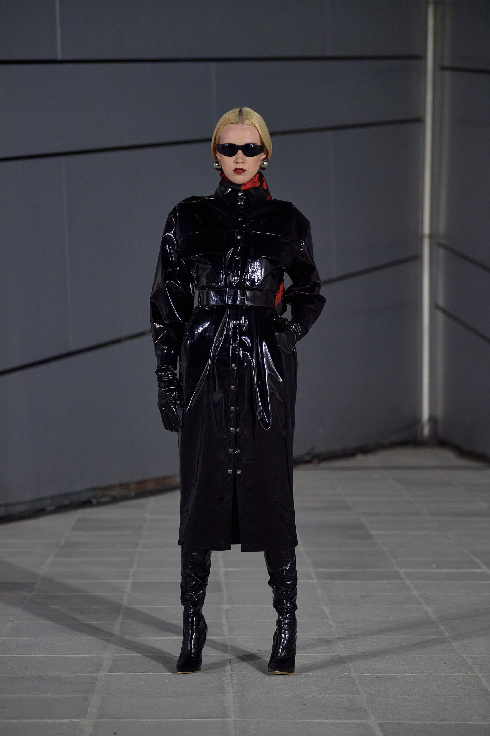 black vinyl fitted coat