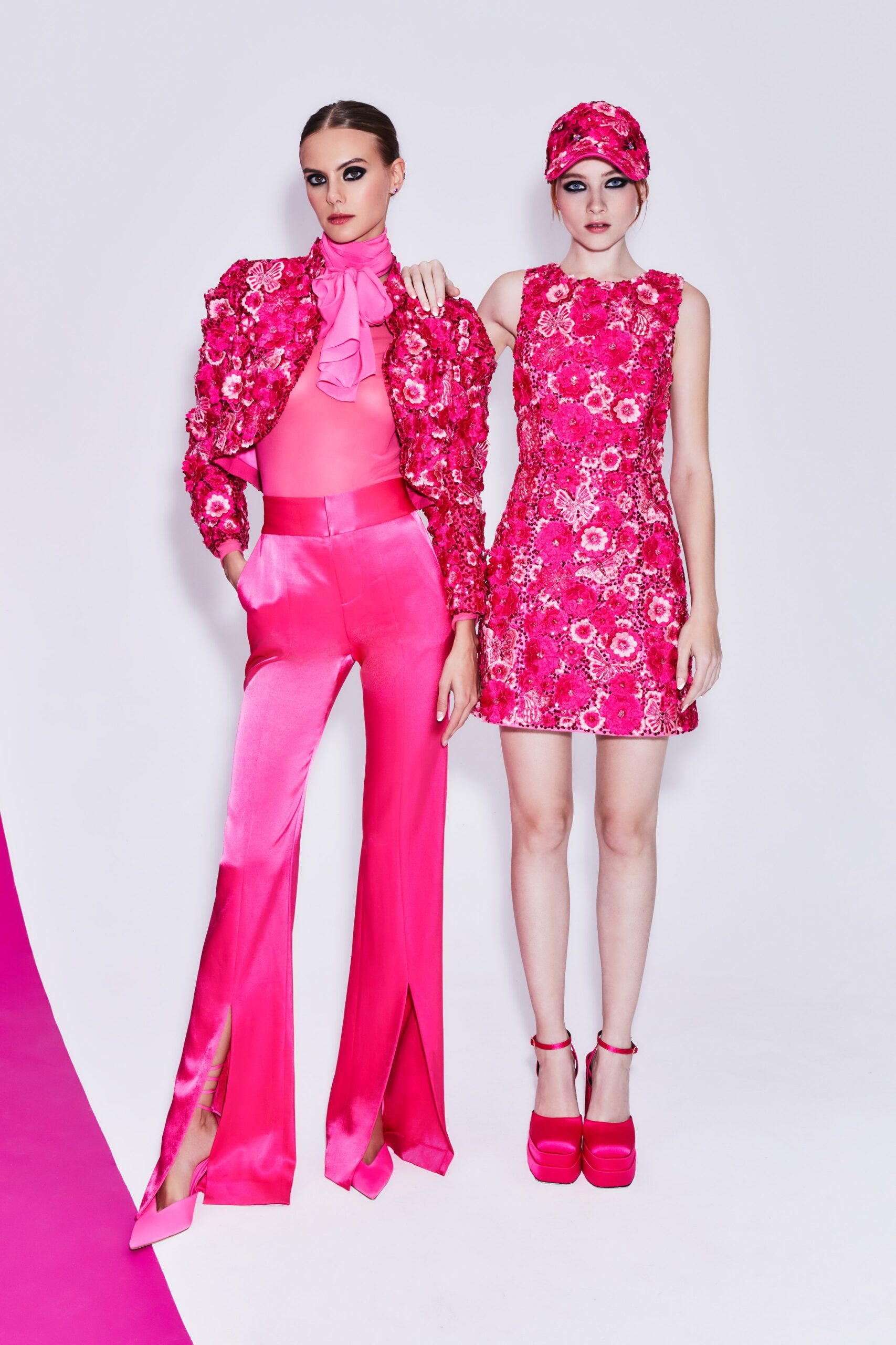 pink silk slit fitted high-waisted flared pants