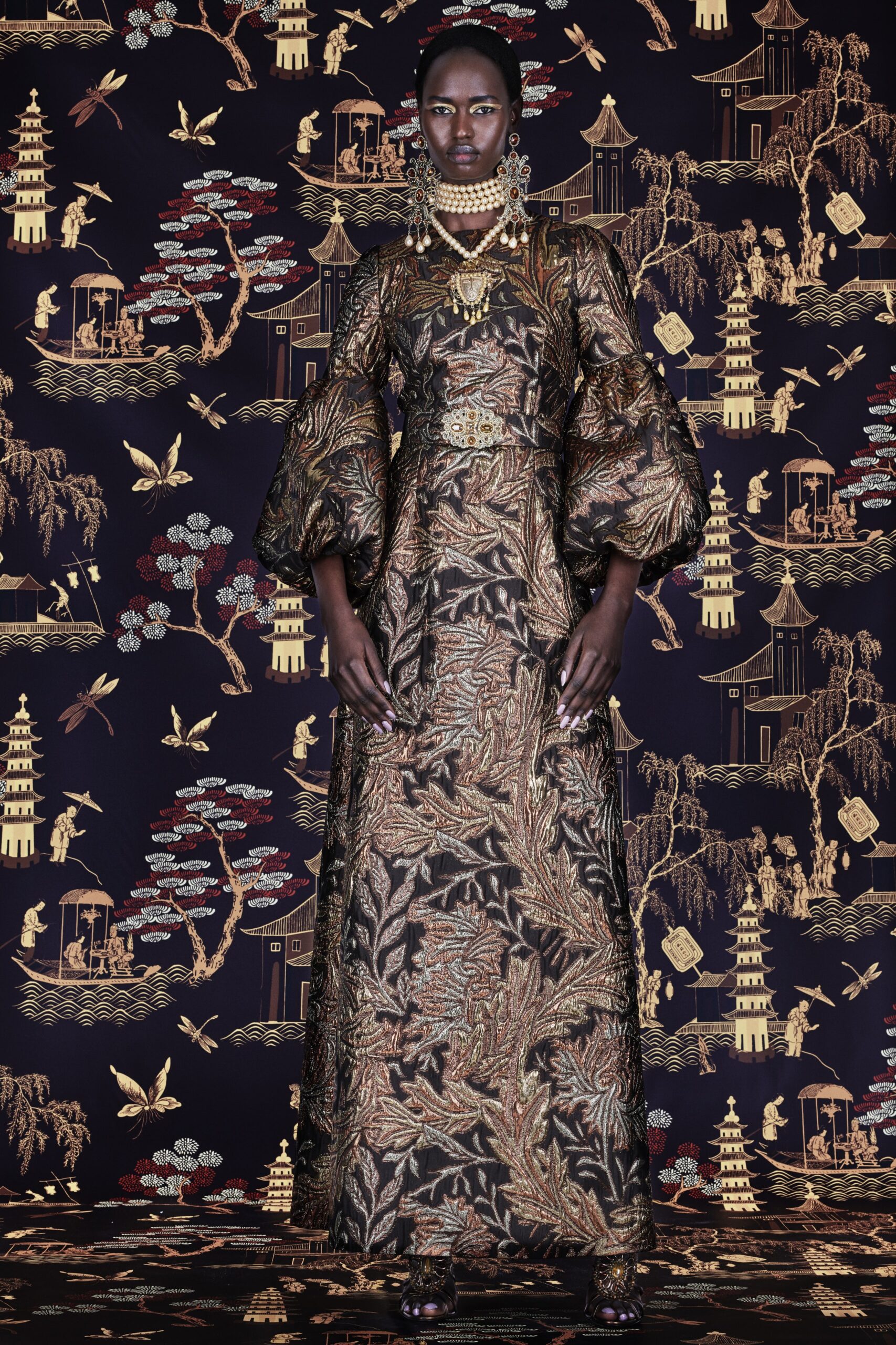 black and gold embroidered gown