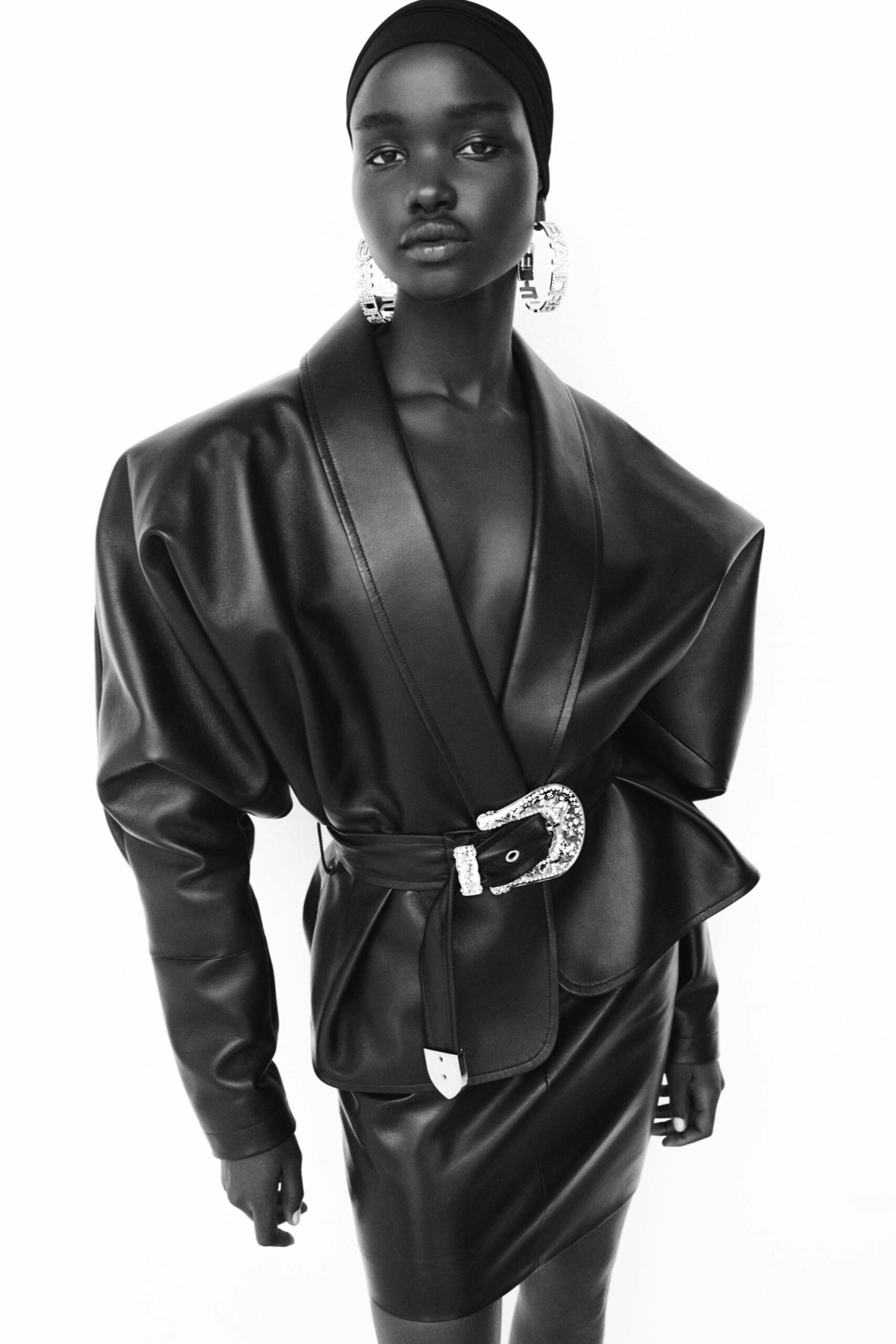 black leather sleeveless v-neck fitted straight-leg dress