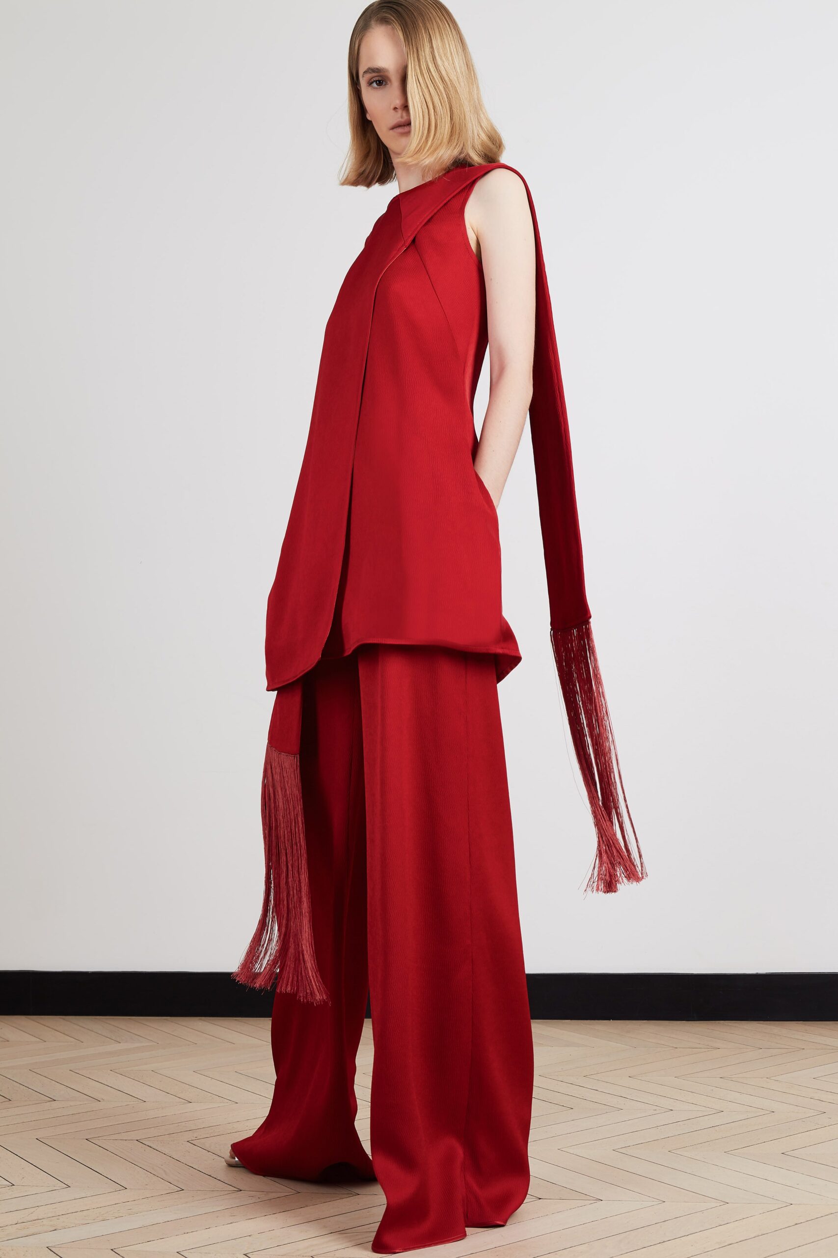 red fitted top with wide-leg pants