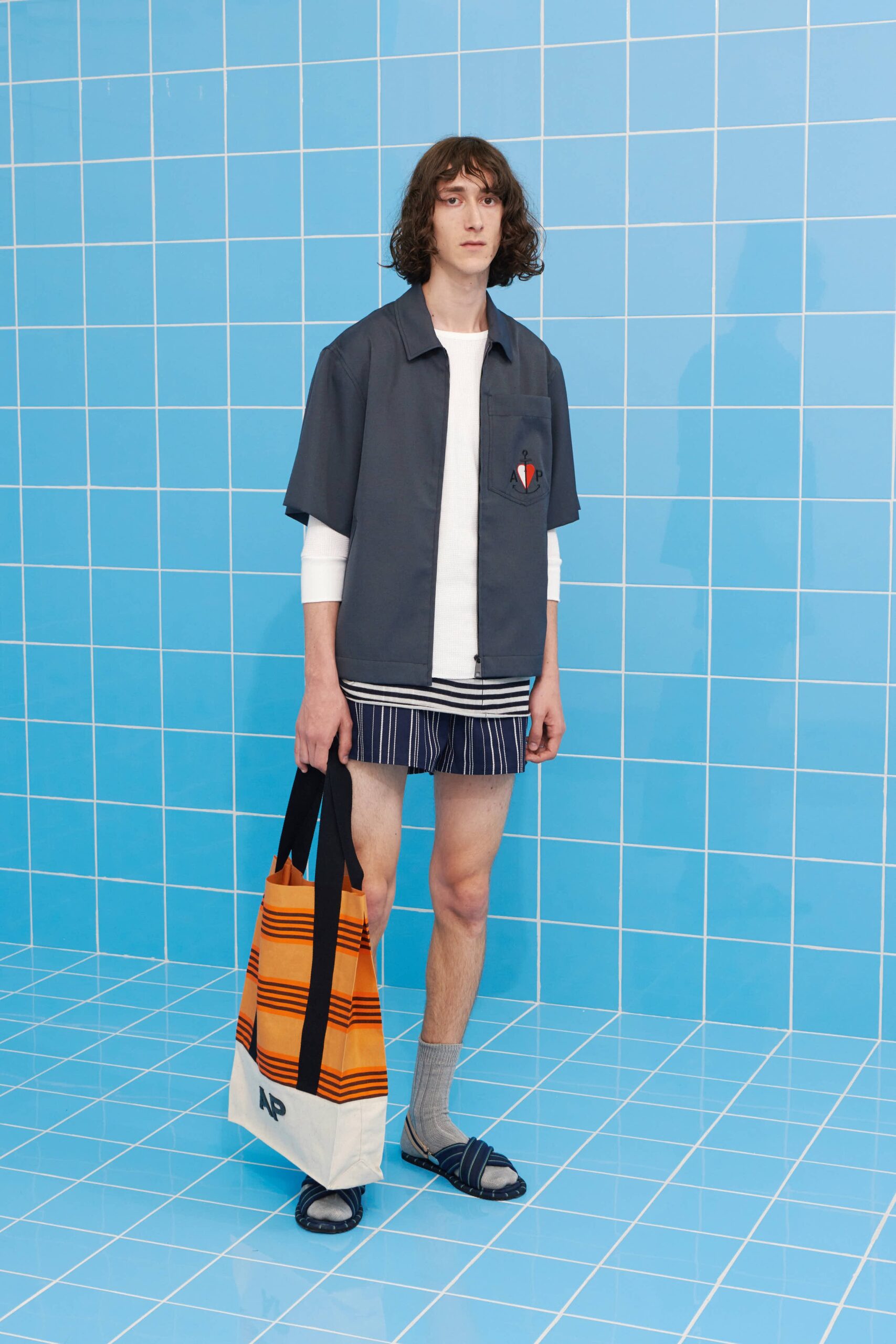 gray shirt with striped shorts