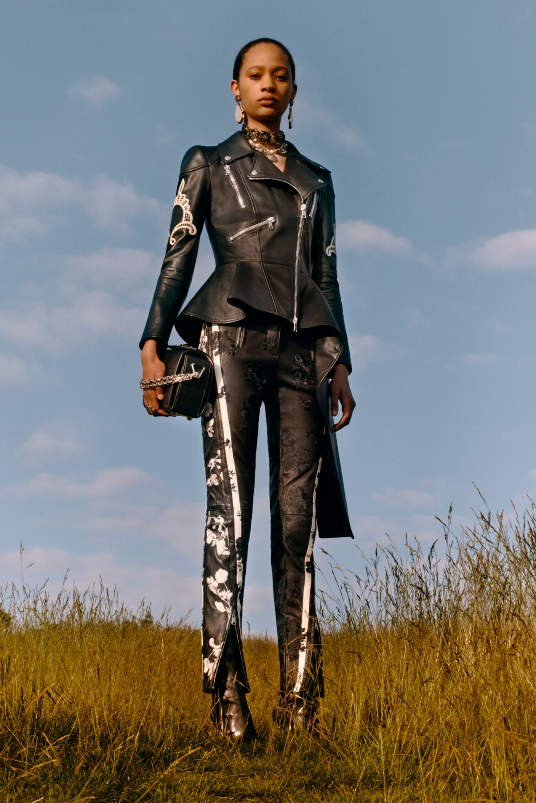 black leather fitted jacket and pants