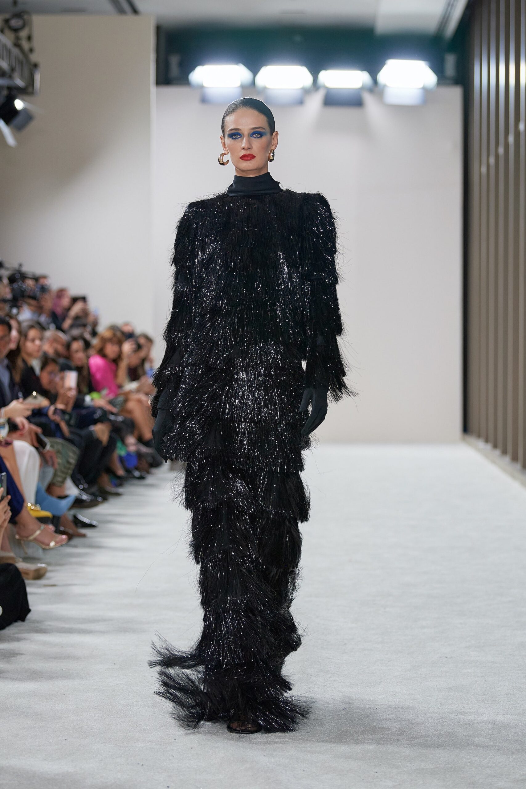 black fringed fur gown