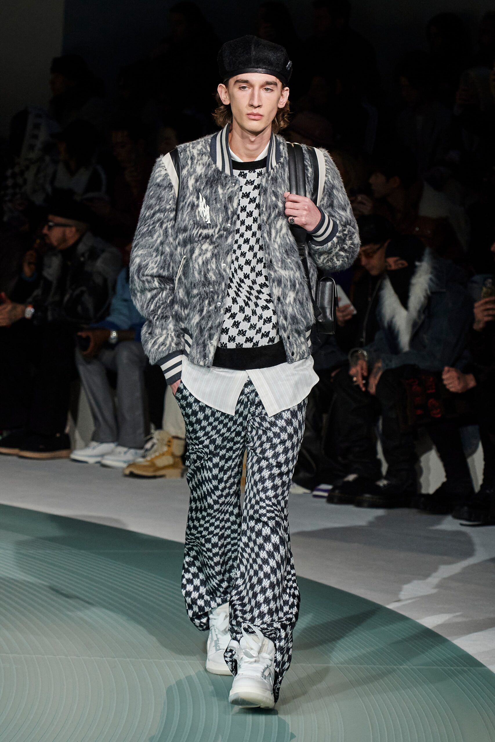 gray faux-fur jacket with checkered sweater and pants