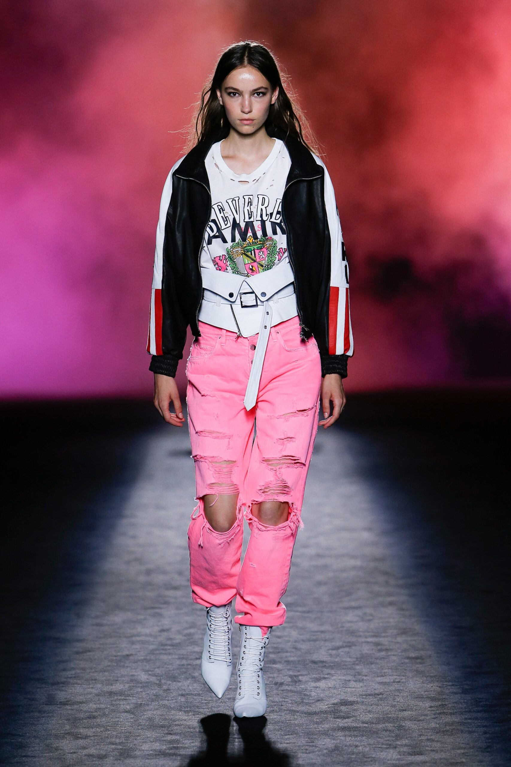 black leather jacket with pink distressed pants