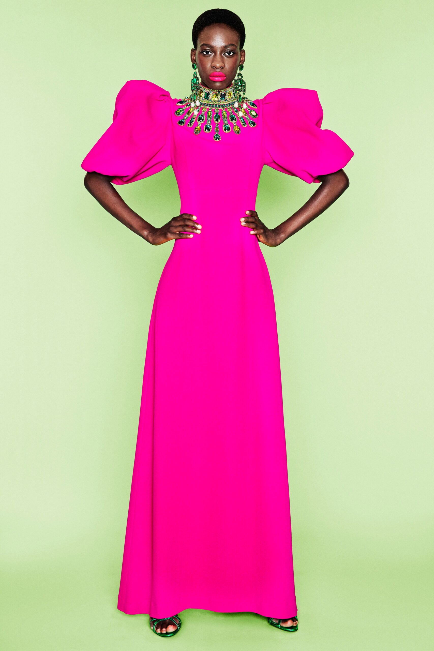 fitted pink gown with puffed sleeves