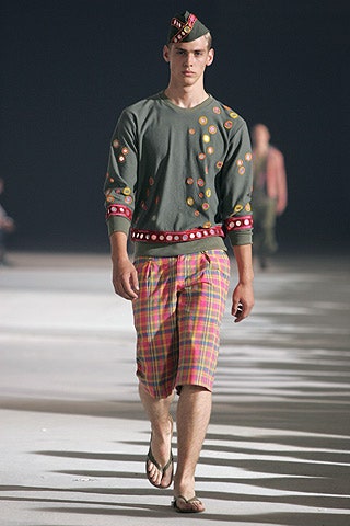 green embroidered sweater with plaid shorts