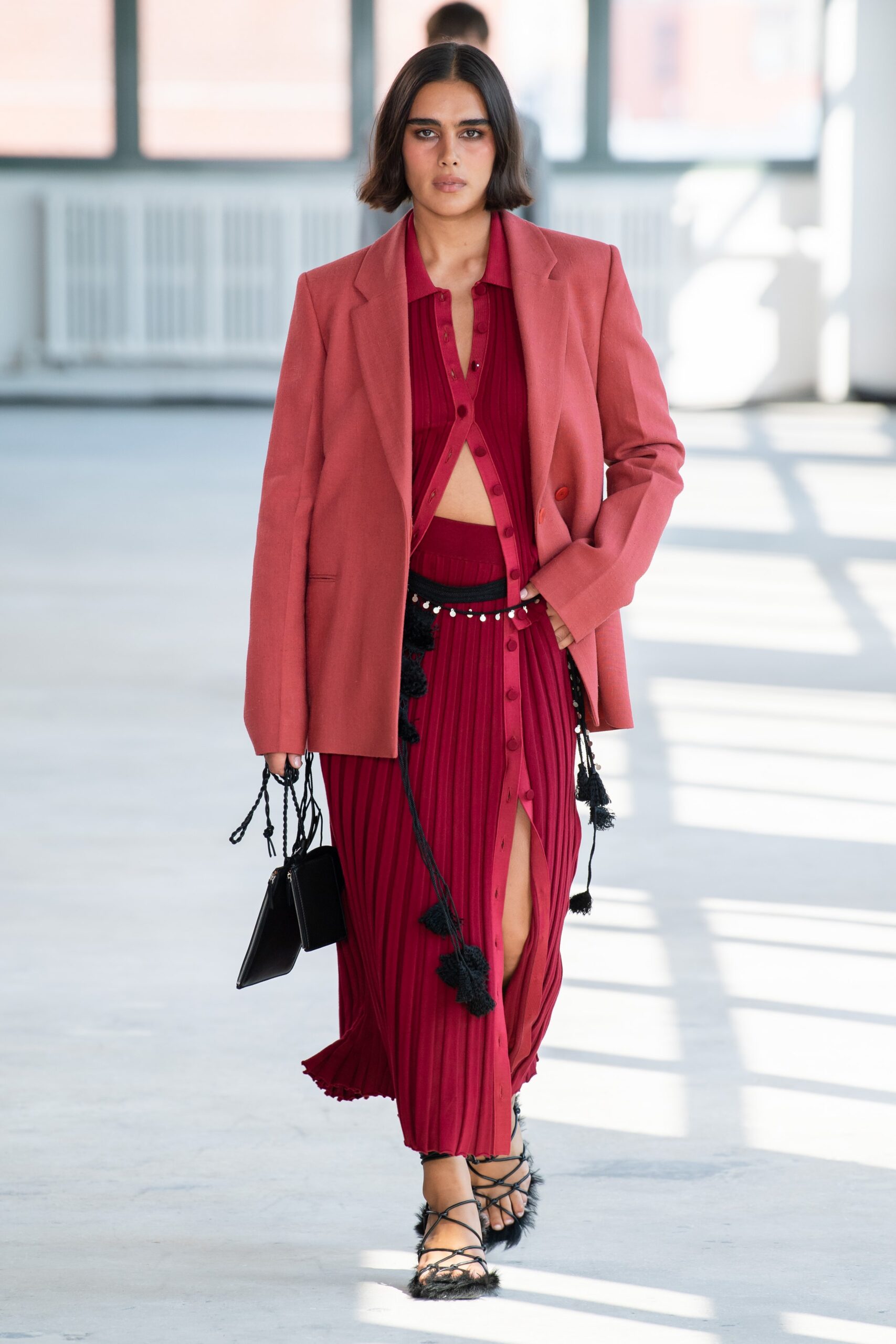 pink tailored blazer and red midi dress