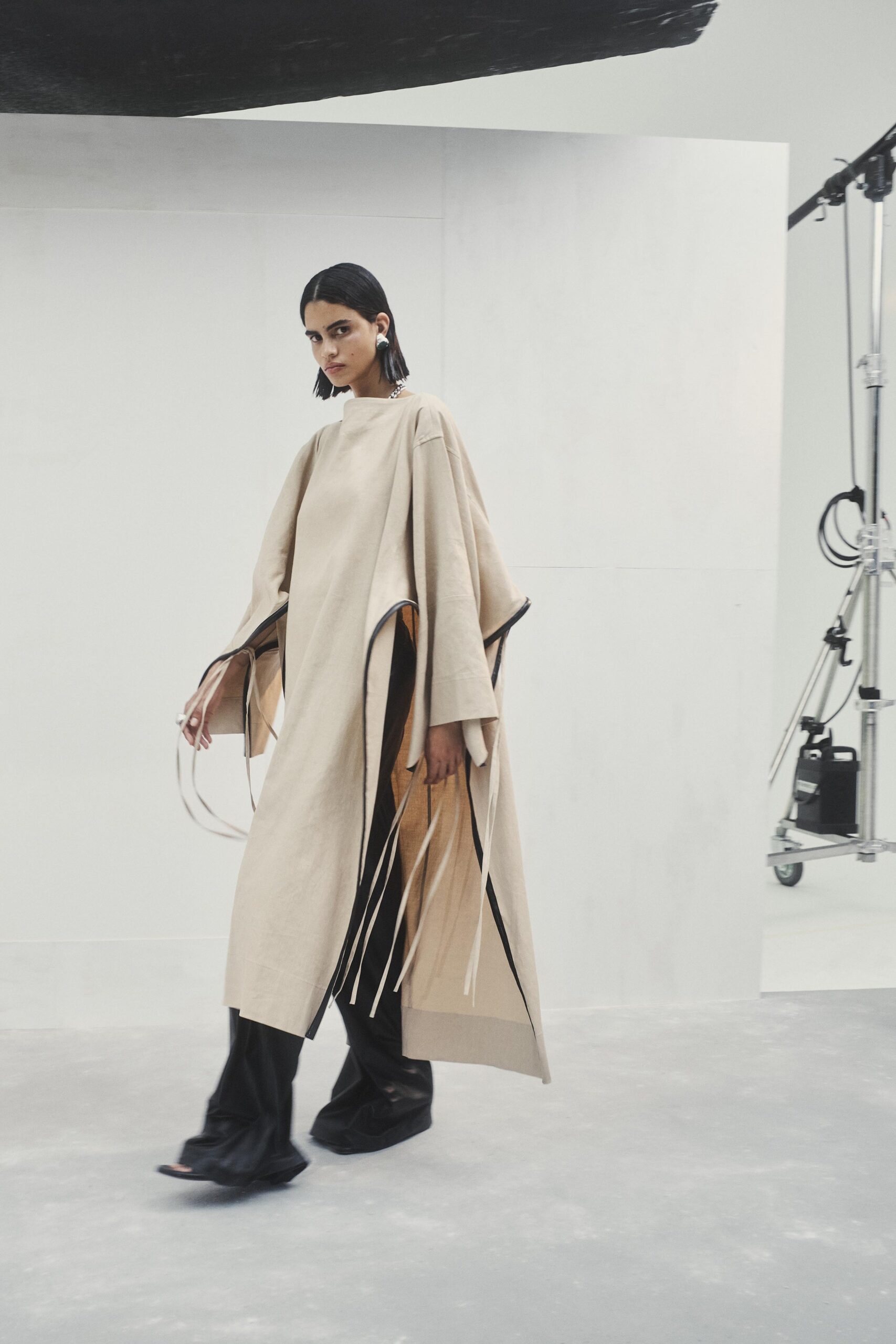beige cotton sleeveless high-neck relaxed fringed poncho