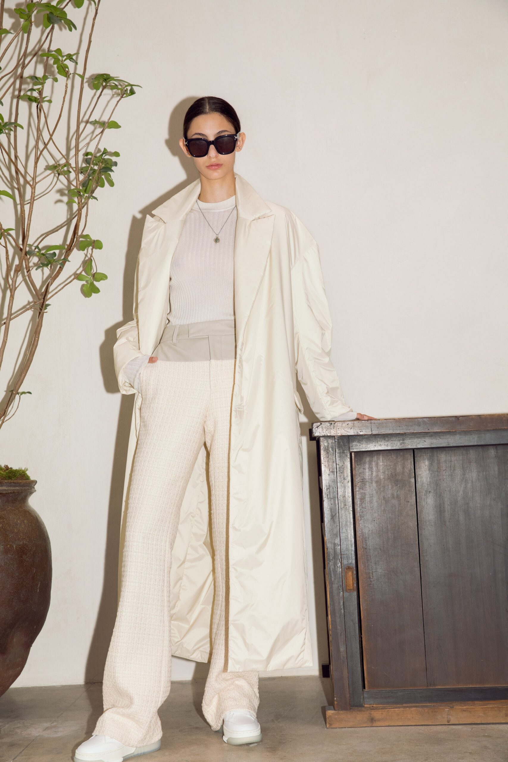 white vinyl coat with beige top