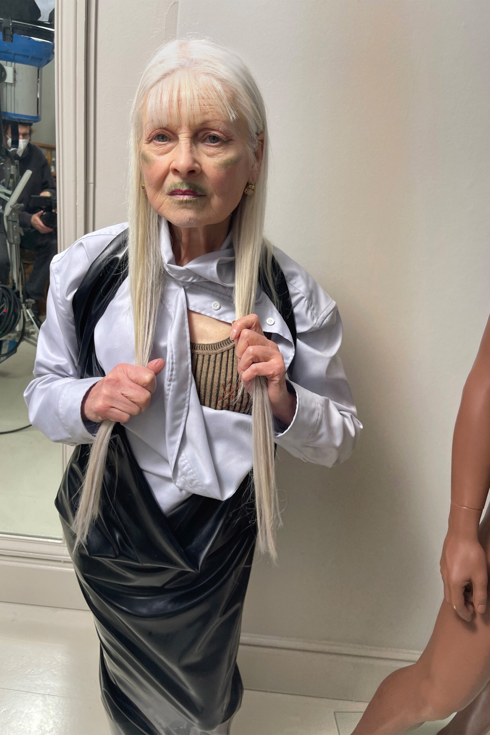 white fitted shirt black vinyl skirt