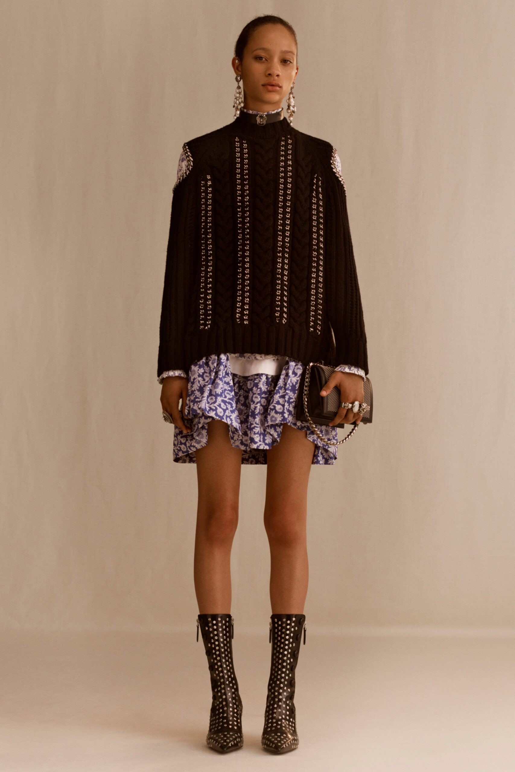 black pleated top with mini skirt