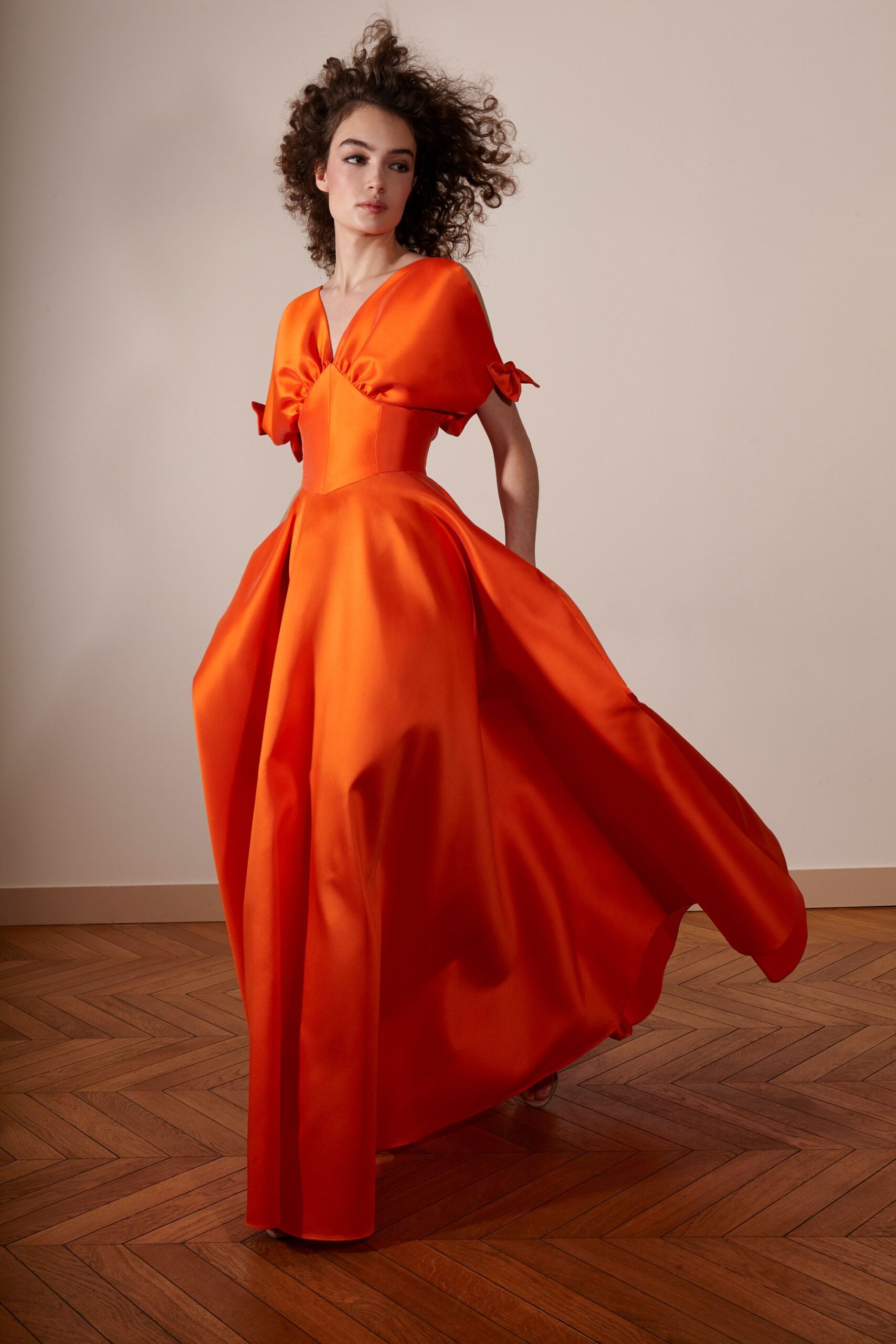 orange silk sleeveless gown